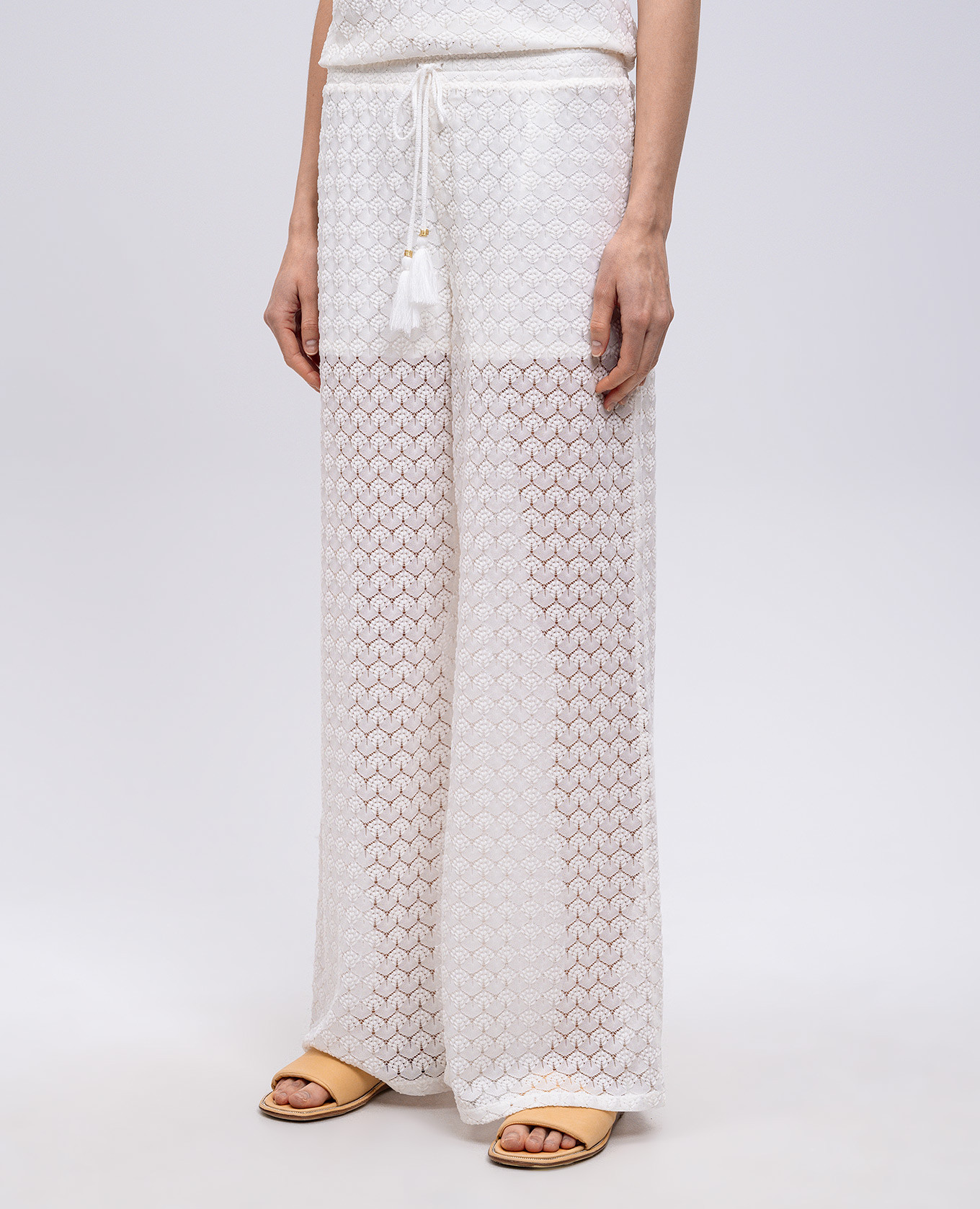 

White pants with an openwork pattern Twinset