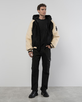 Balmain Black cargo jeans with logo patch DH1MI080CF31
