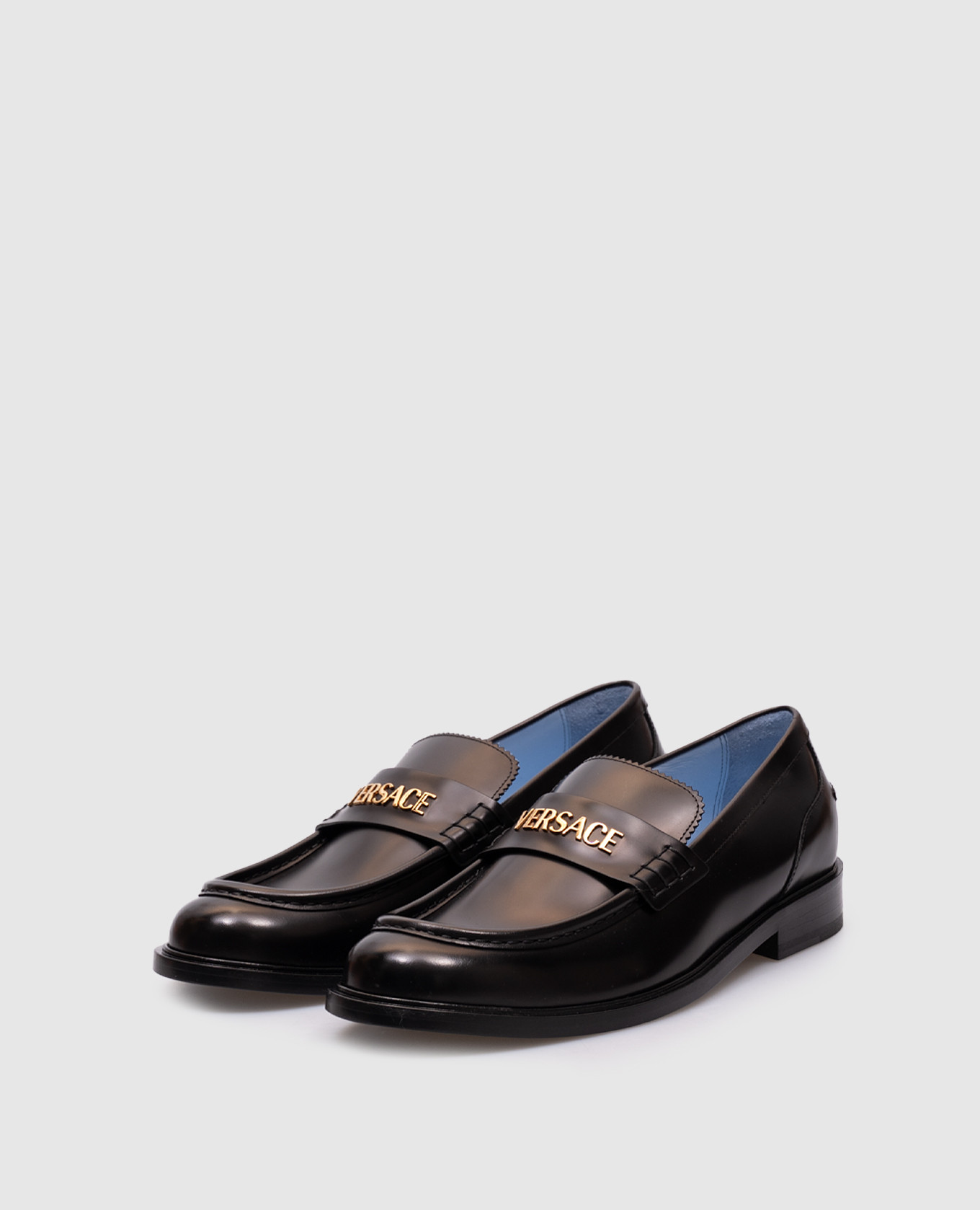 

Black leather glossy loafers with metal logo Versace