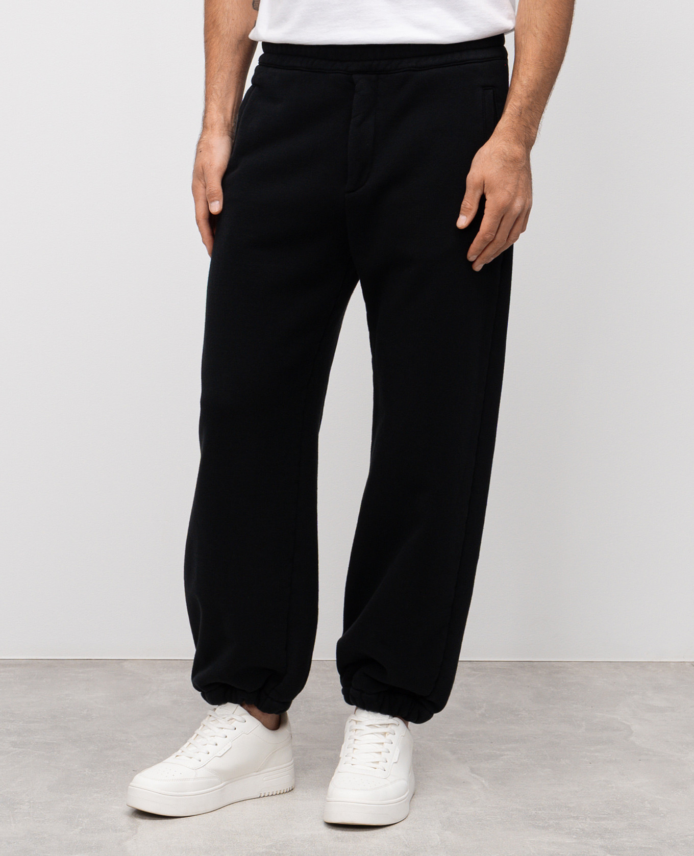 

Blue joggers with textured logo emblem Alexander McQueen