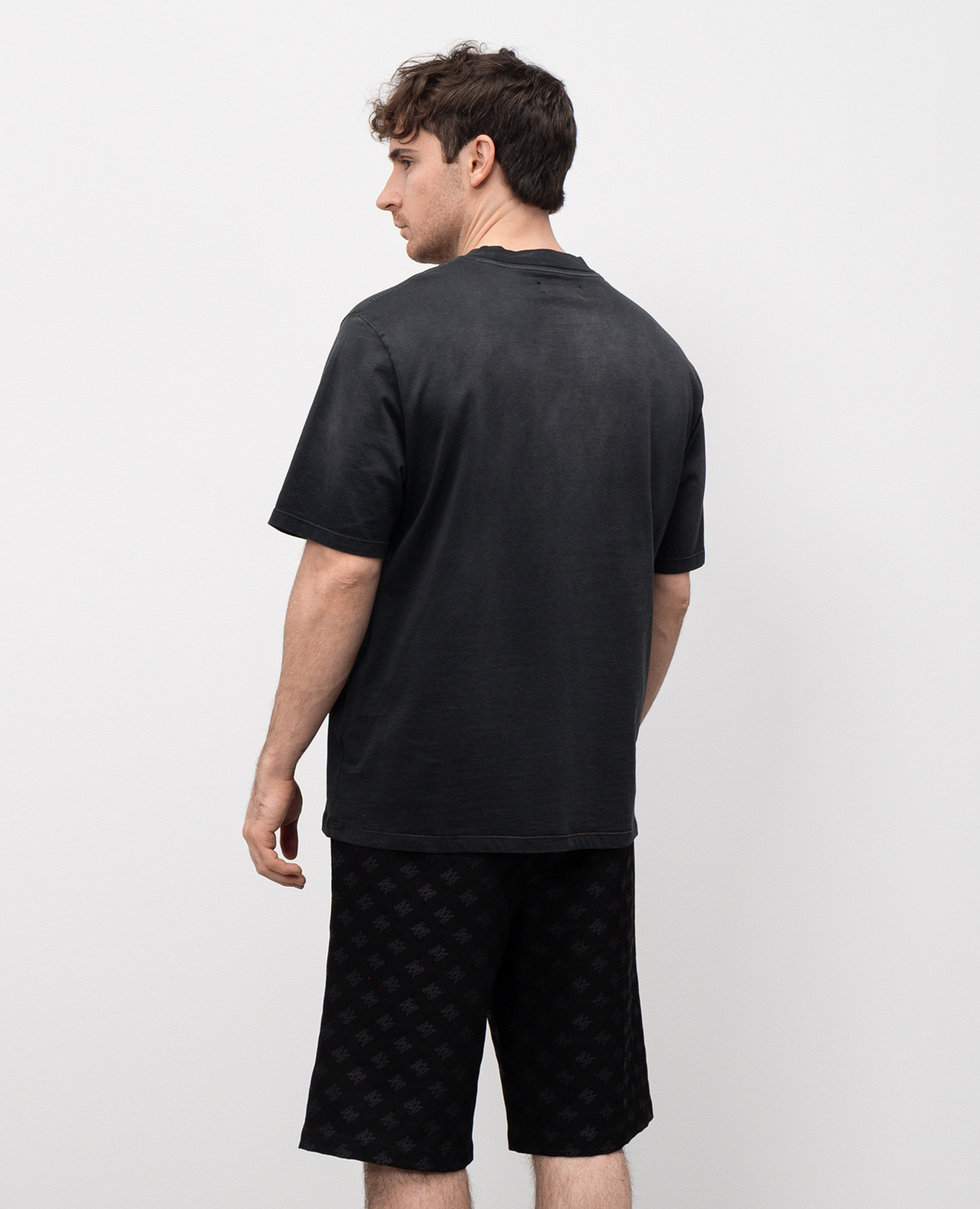 

Black T-shirt SATURDAY NIGHT AMIRI