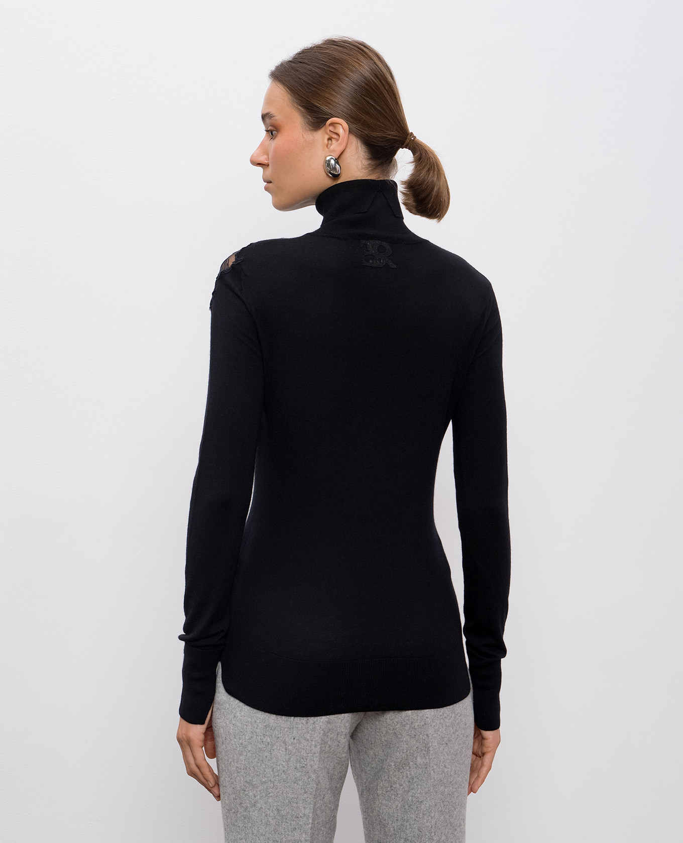 

Black wool turtleneck with appliqué Ermanno Scervino