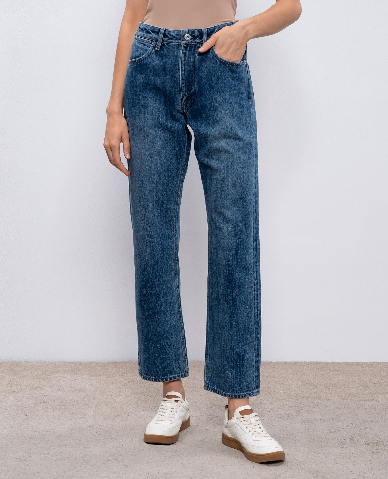 

Blue jeans with a distressed effect Jil Sander