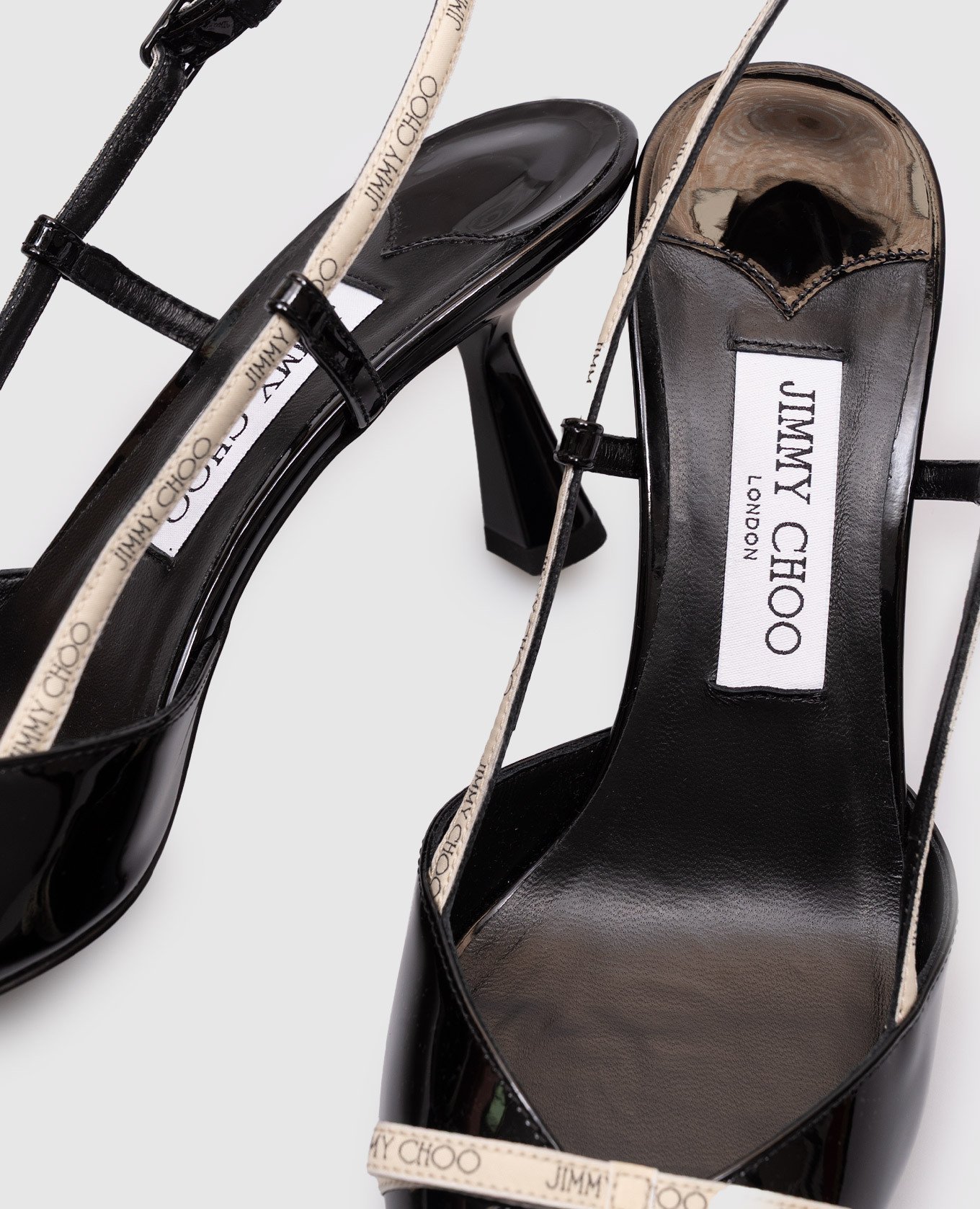 

Camila black patent leather slingbacks Jimmy Choo