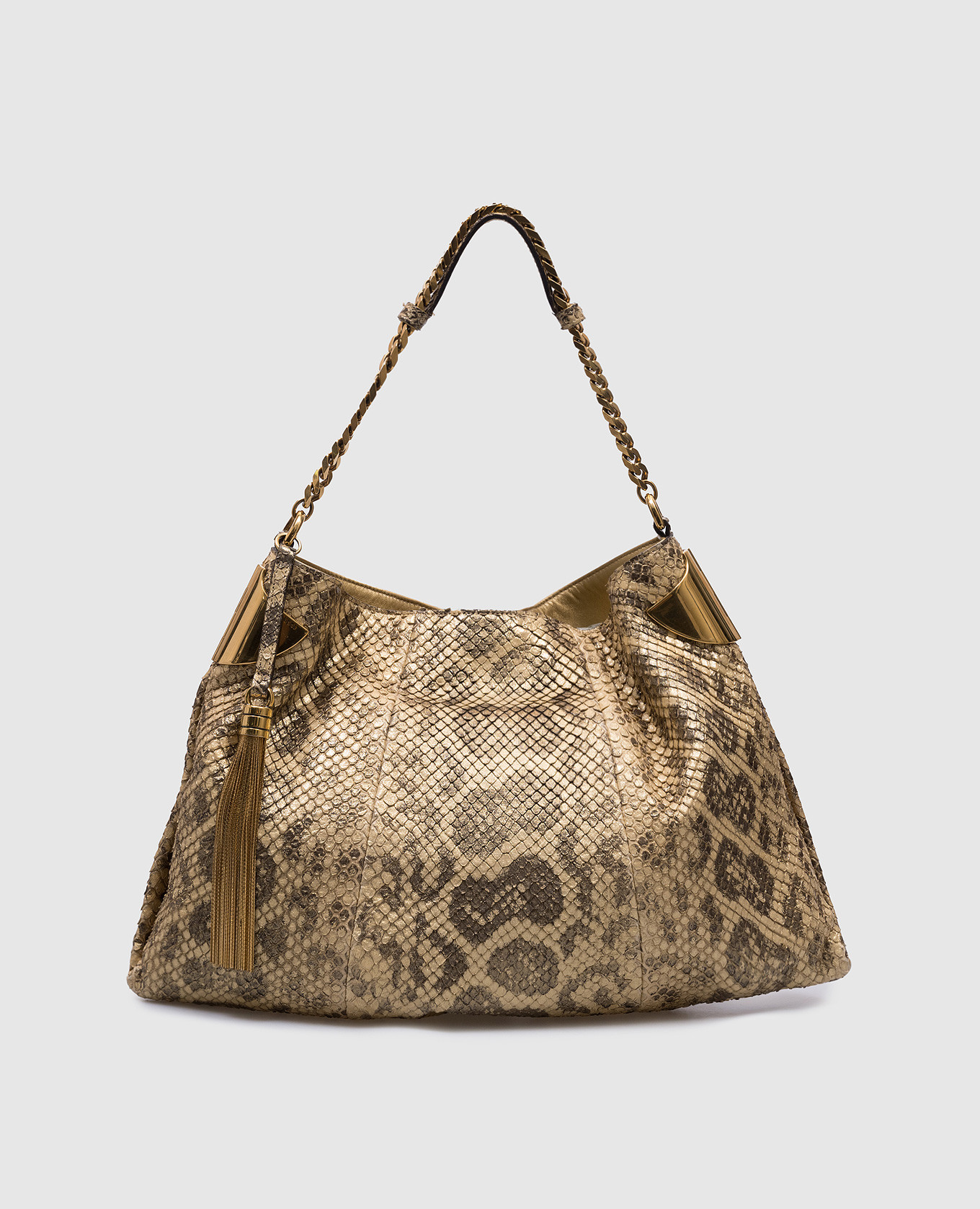 

Golden leather bag with embossing under the skin of a reptile Gucci