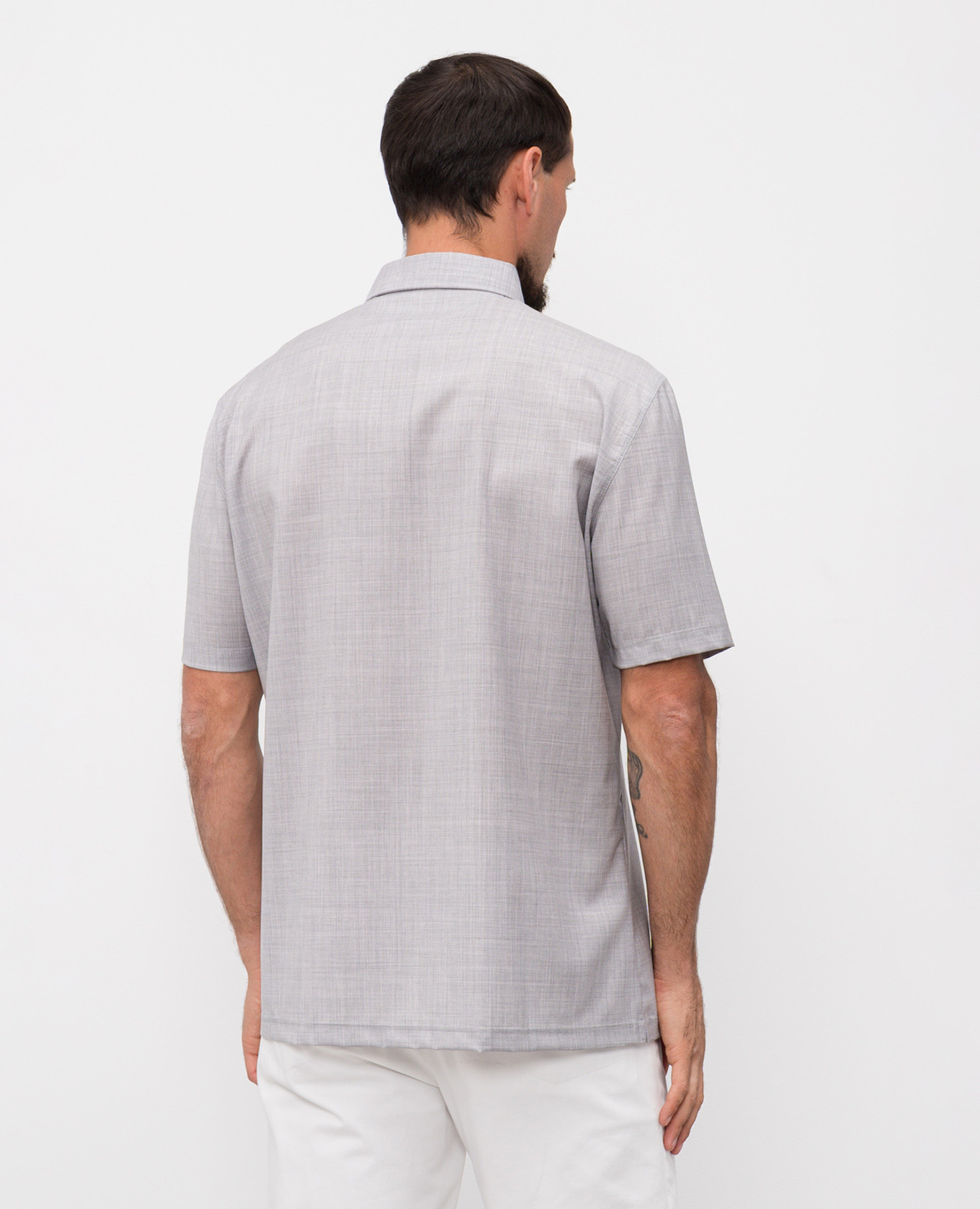 

Grey wool polo shirt with logo emblem print Brunello Cucinelli