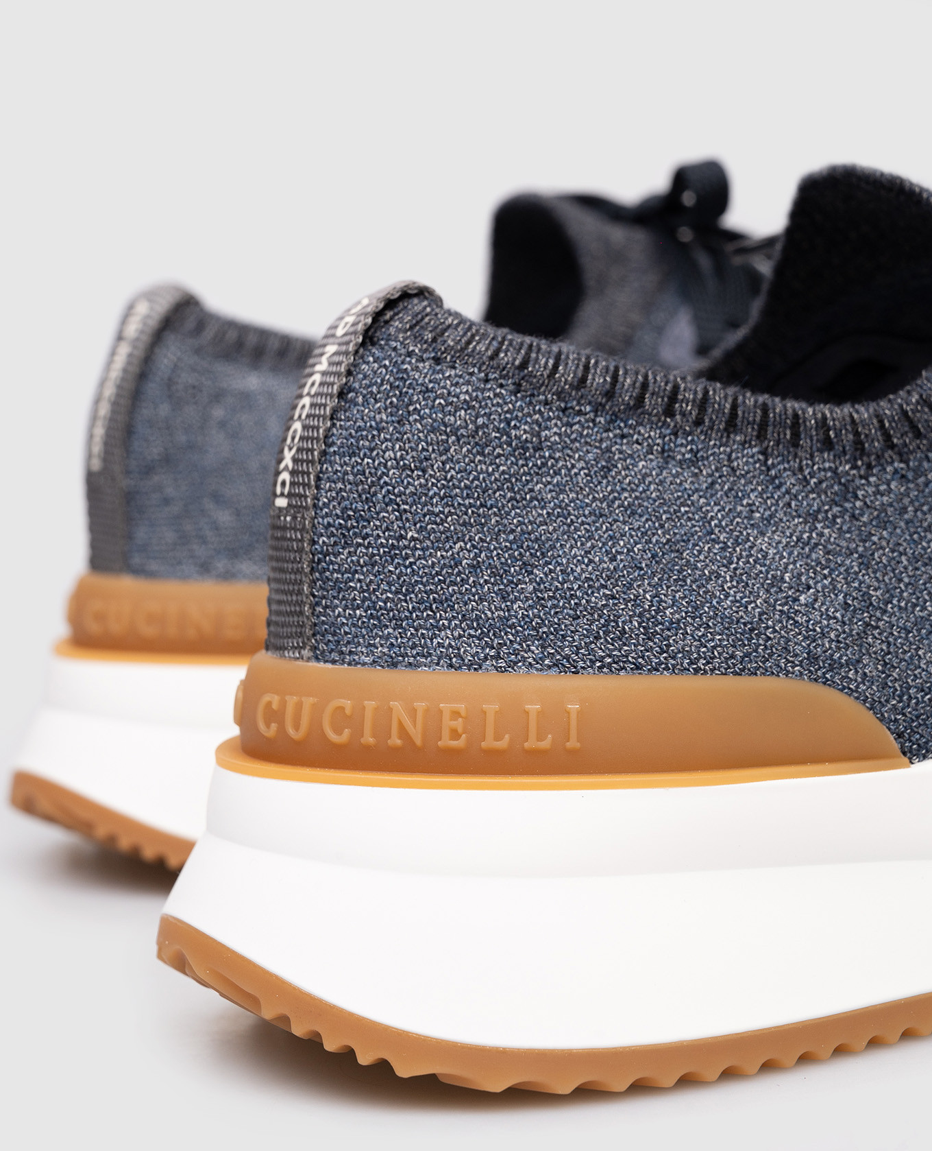 

Blue sneakers with textured logo Brunello Cucinelli