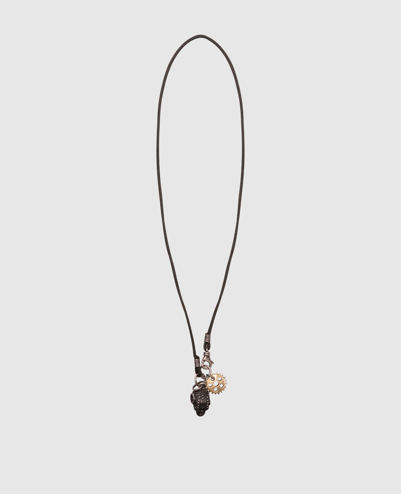 

Black cord with silver skull pendant King Baby