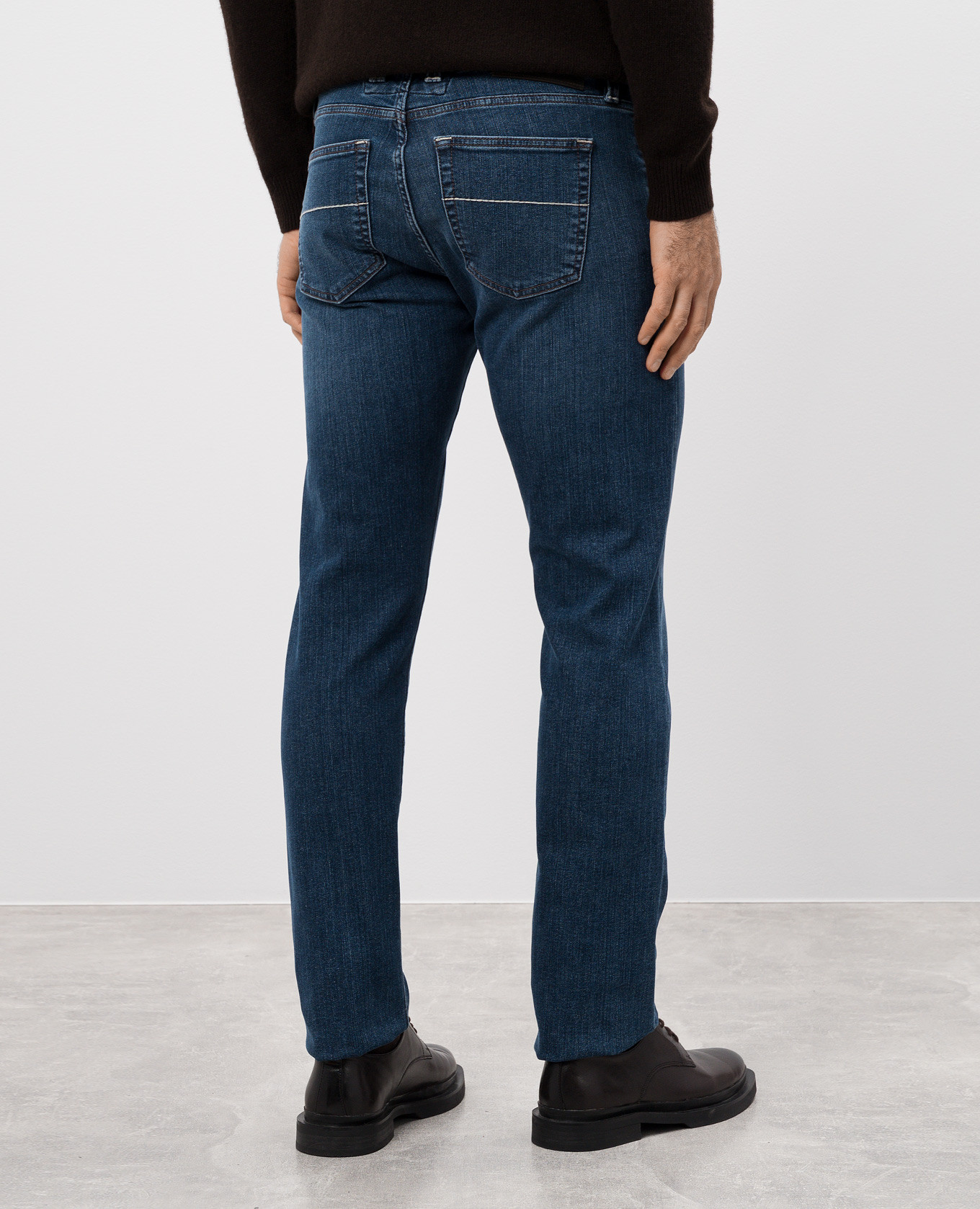 

Blue Michelangelo jeans with metallic logo patch Tramarossa