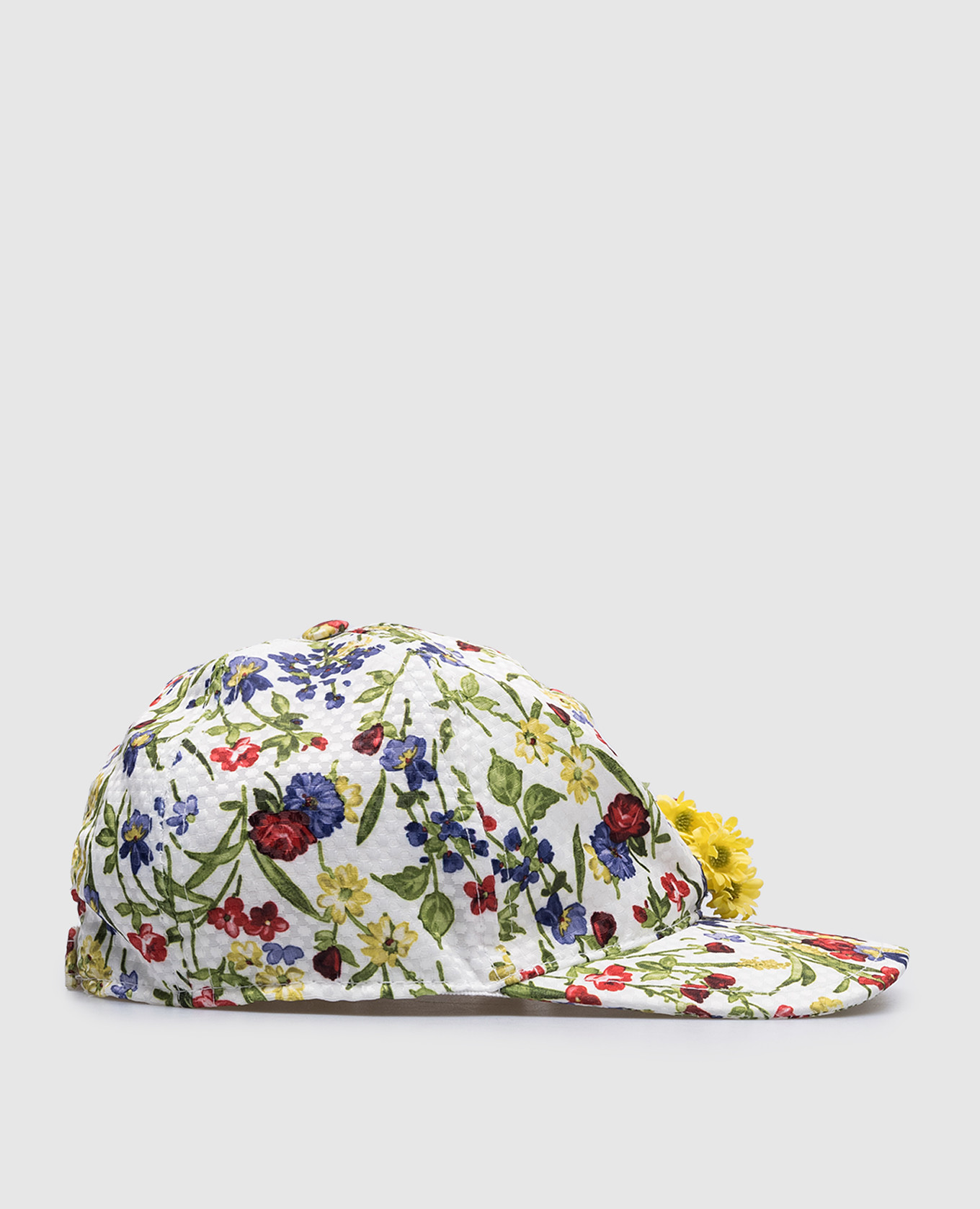 

Children's white cap in a floral print Il Trenino