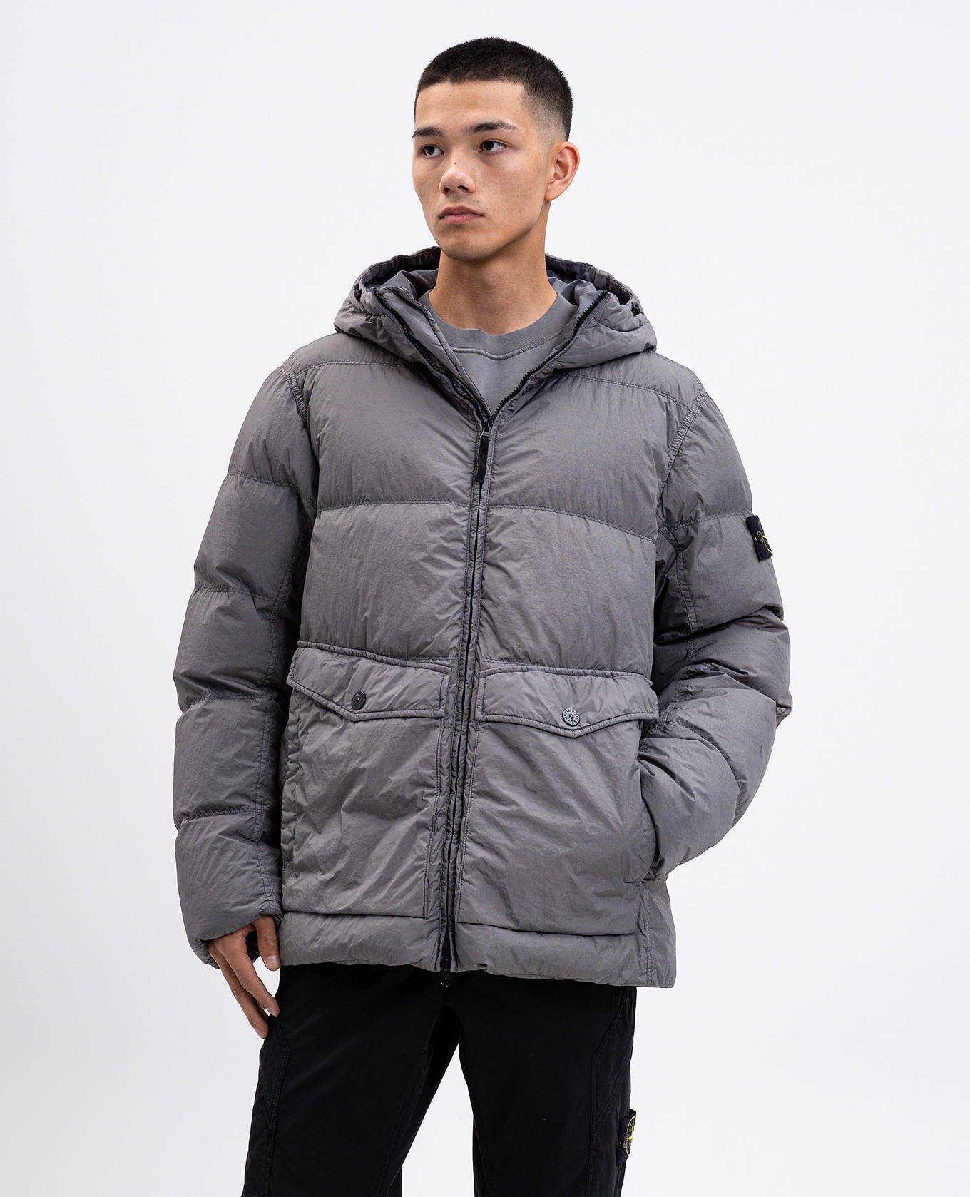 

Green down jacket with logo Stone Island