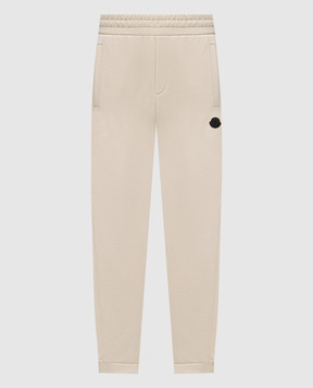Moncler Beige joggers with logo patch K20918H0000289AZY