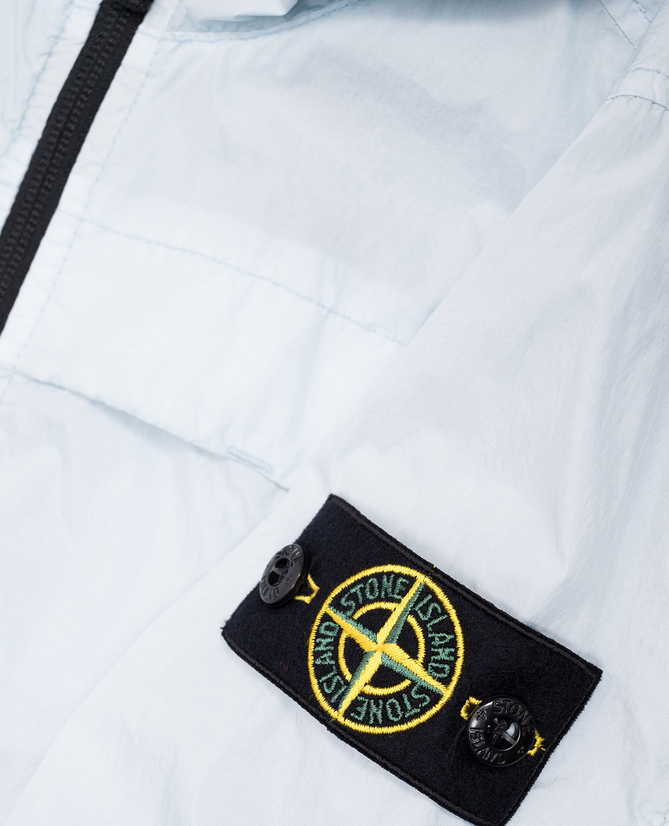 

Children's blue windbreaker with patch Stone Island, Light blue