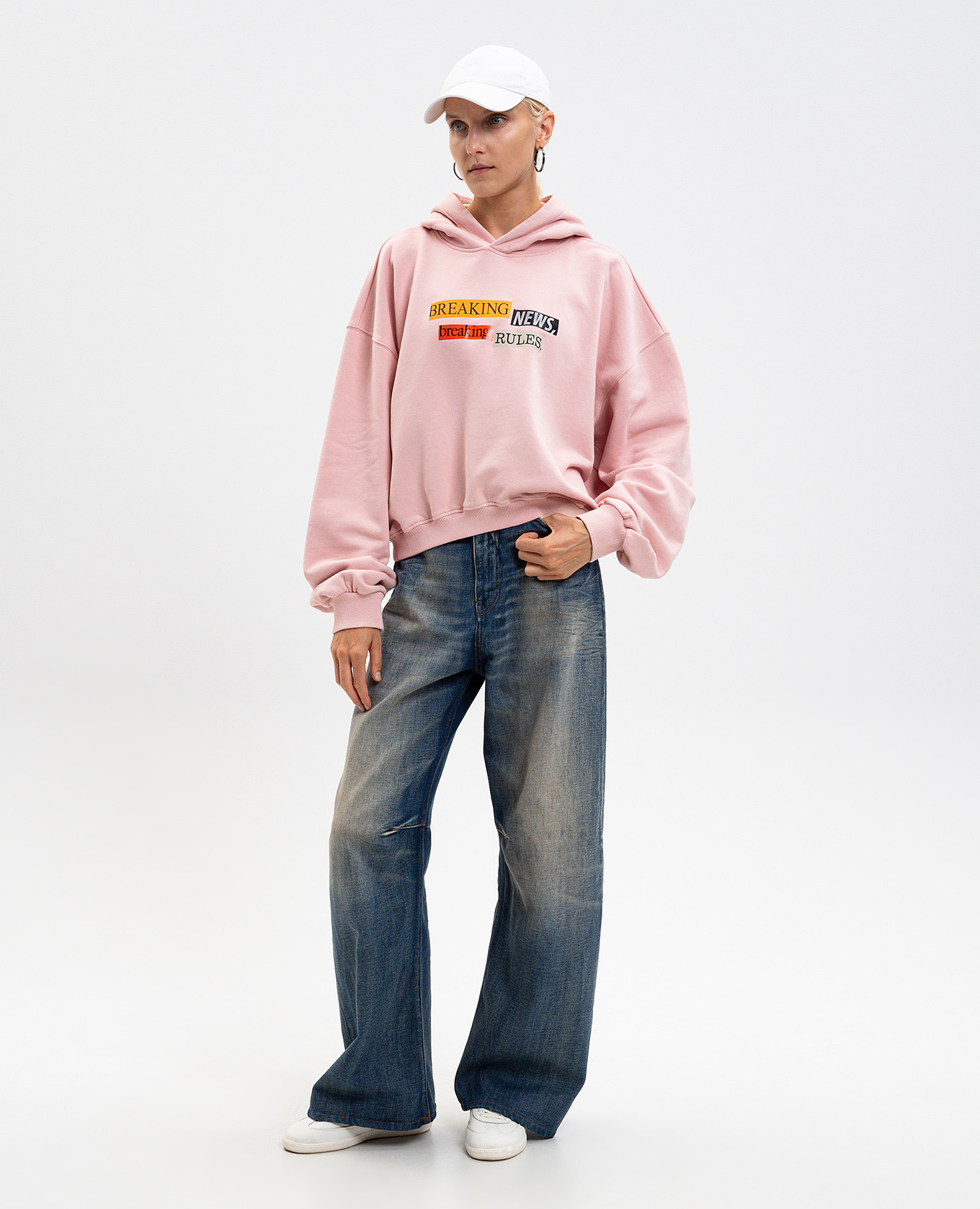 

Pink hoodie with a print of the inscription Palm Angels