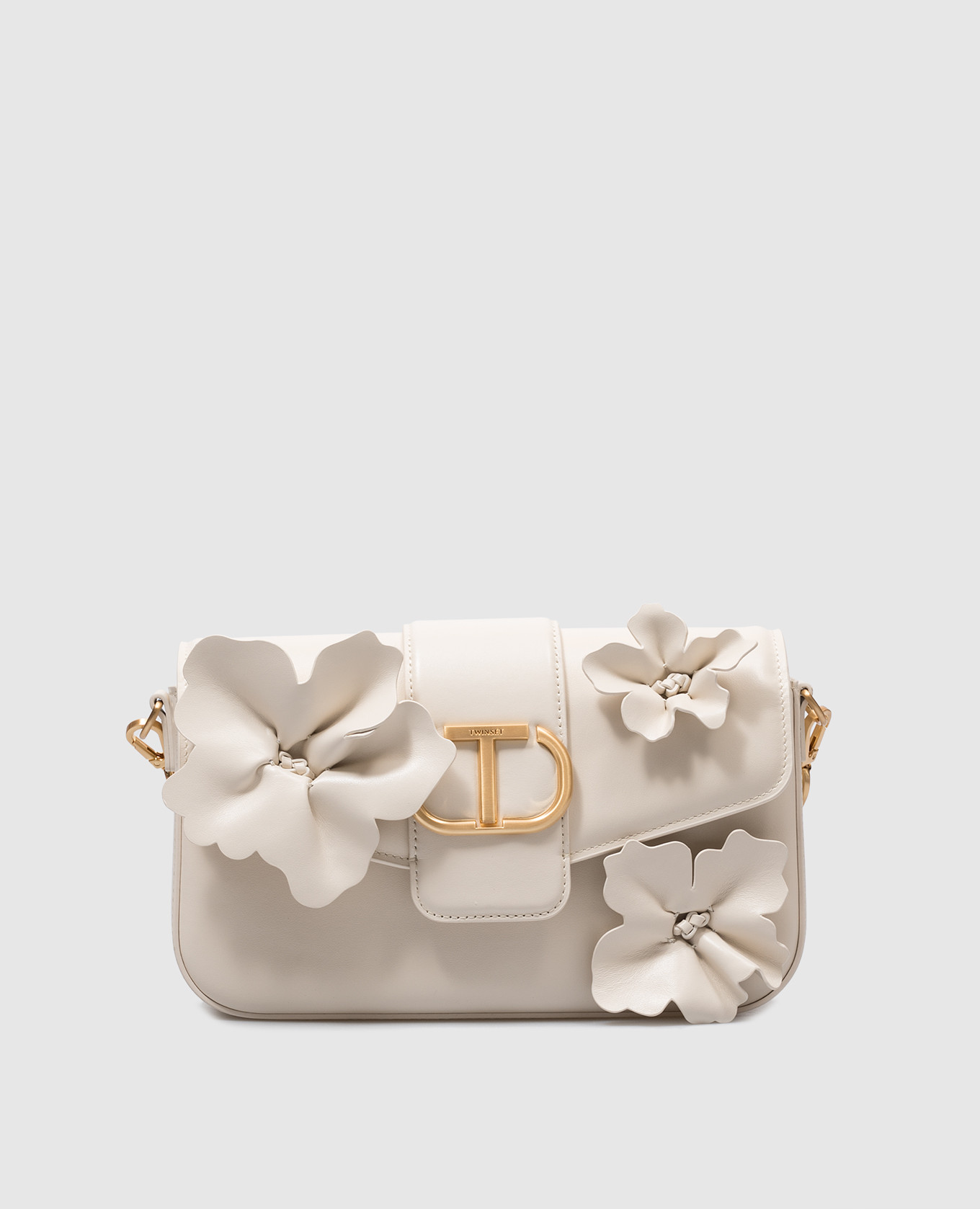 

Beige leather messenger bag with flower appliques Twinset