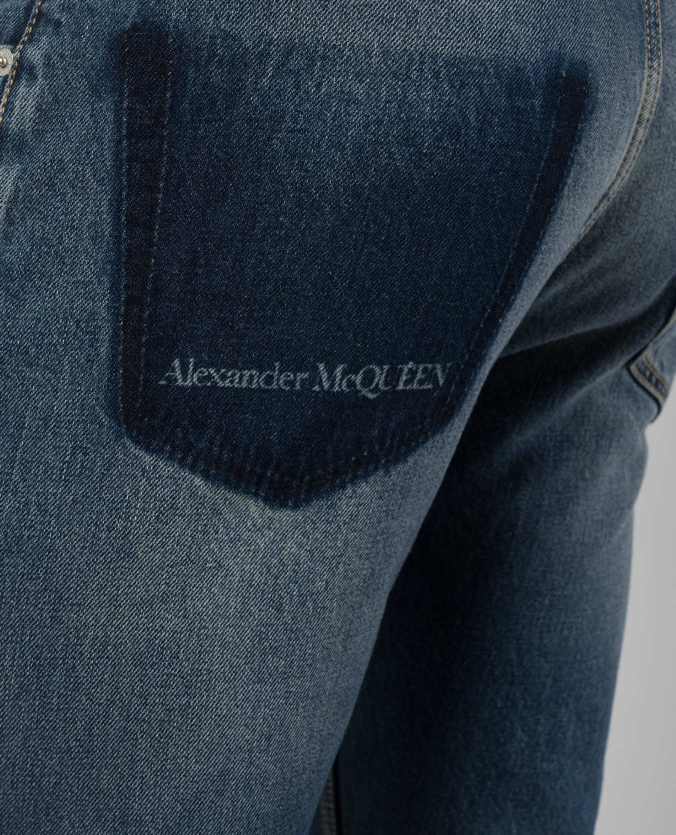 

Blue distressed jeans with logo Alexander McQueen
