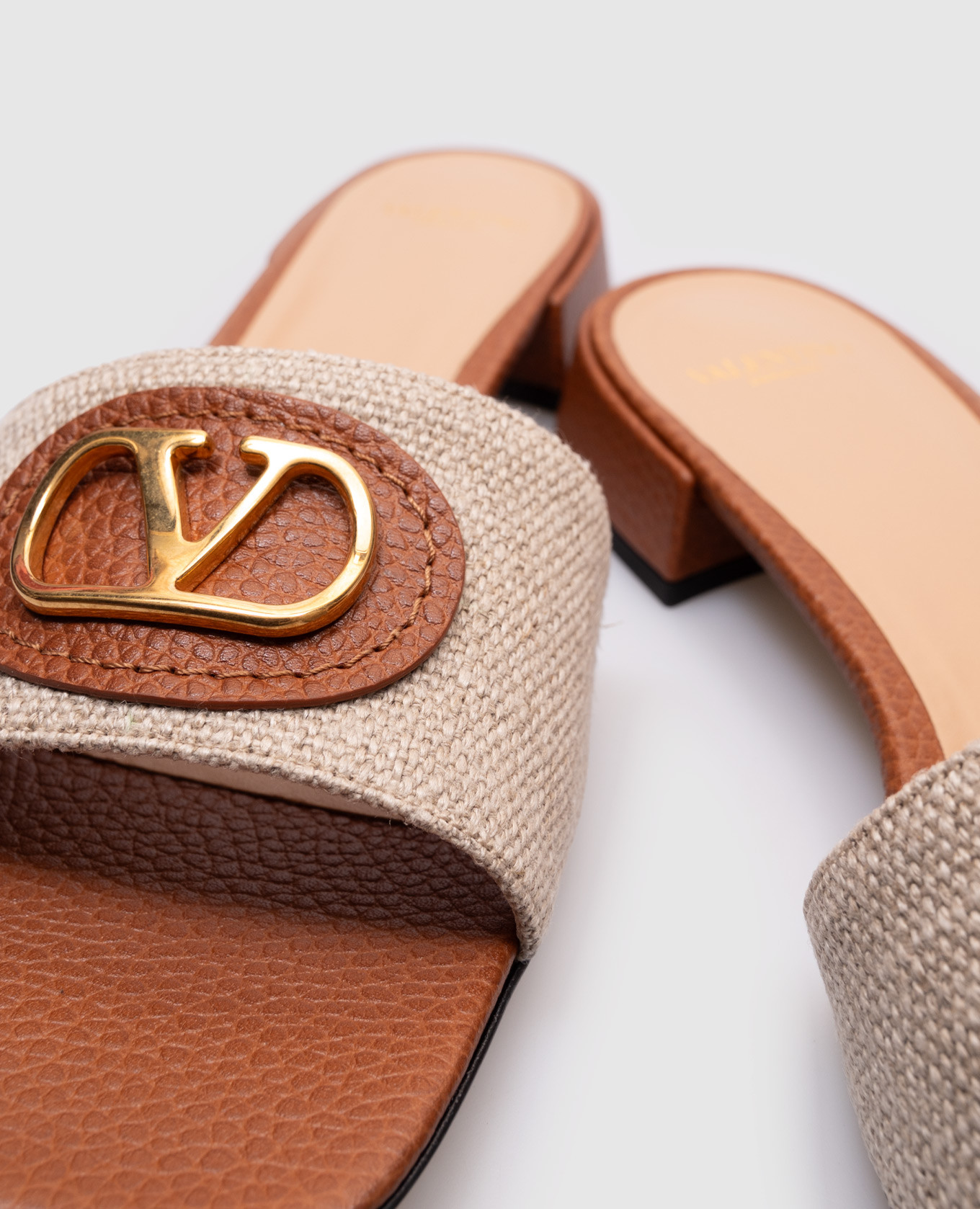 

Beige logo combination flip-flops Valentino