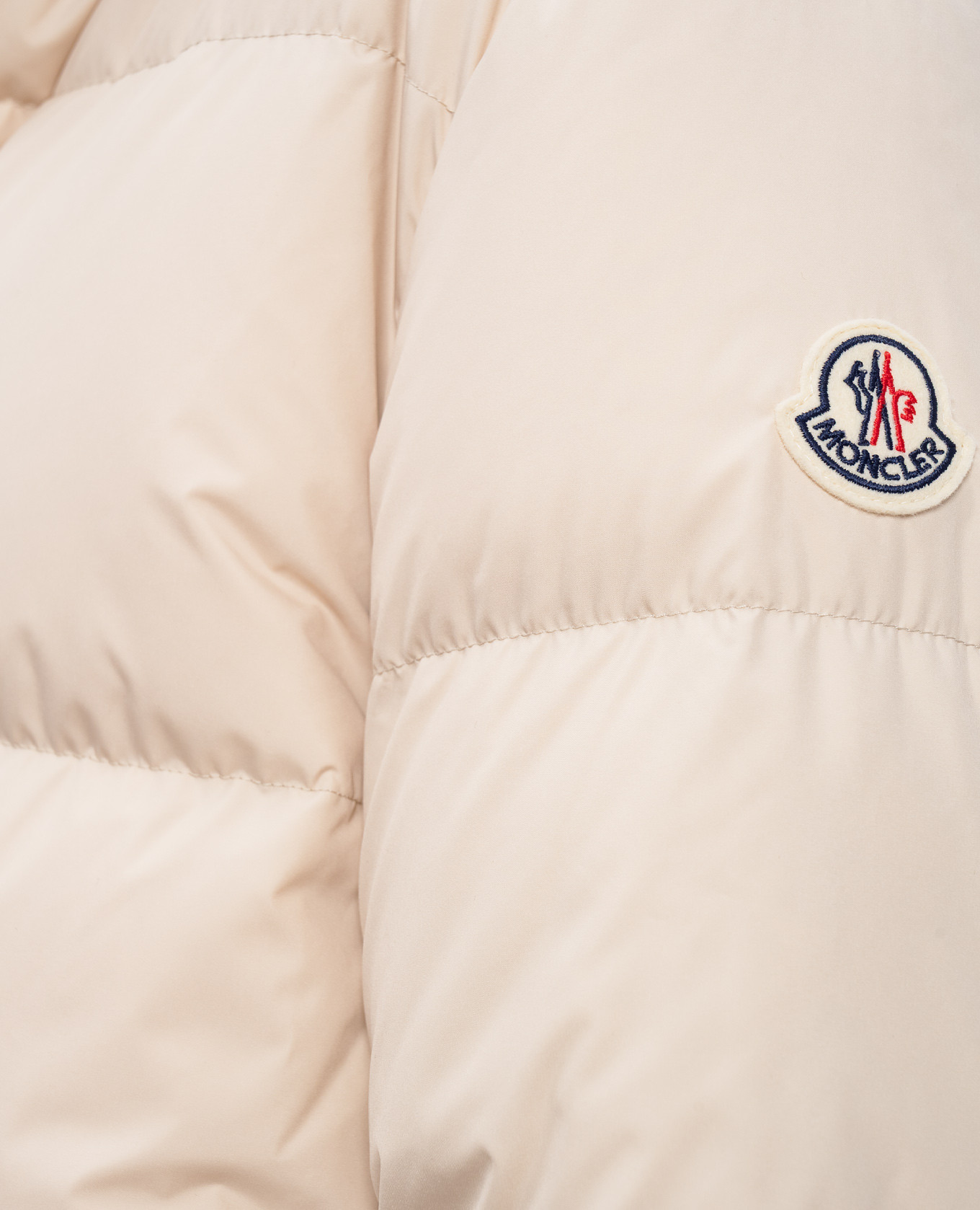 

Beige down jacket with logo patch Moncler