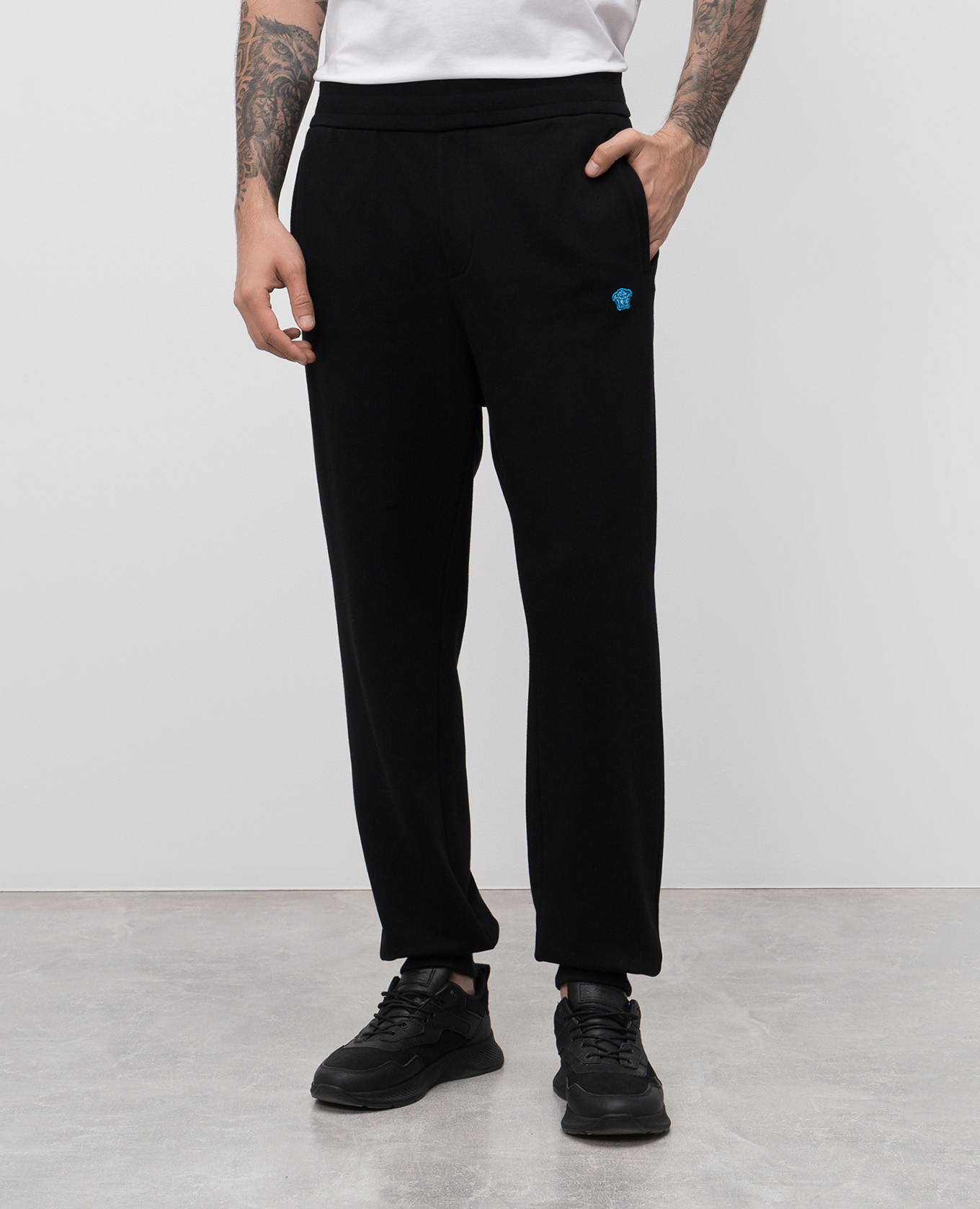 

Black joggers with logo patch Versace