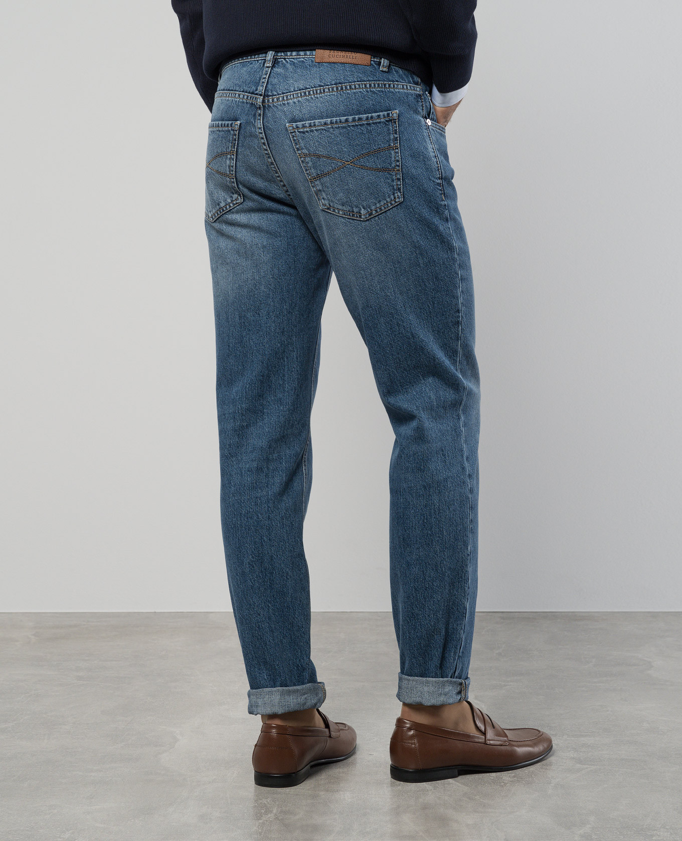 

Blue jeans with a distressed effect Brunello Cucinelli