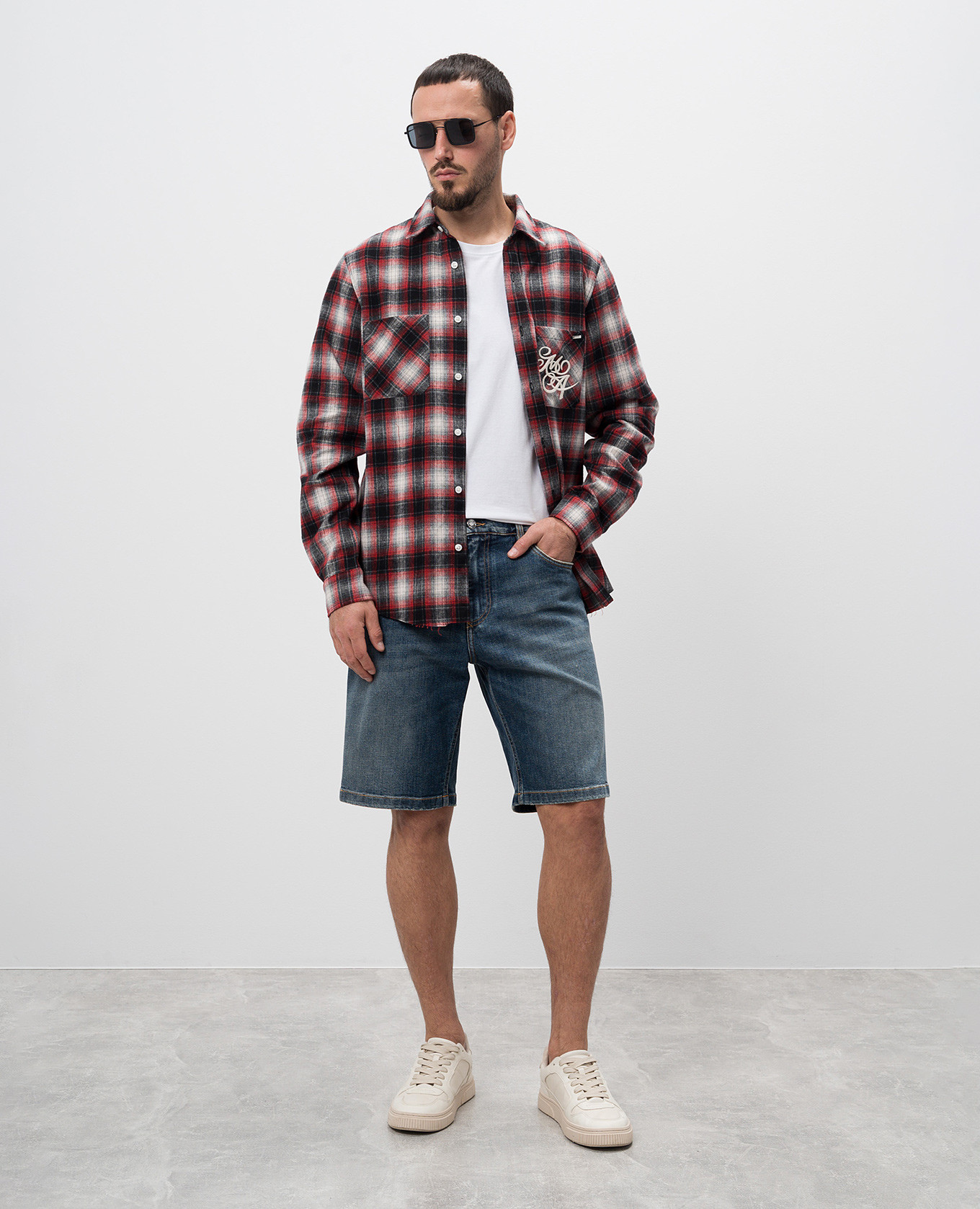 

Blue distressed denim shorts with logo Dolce&Gabbana