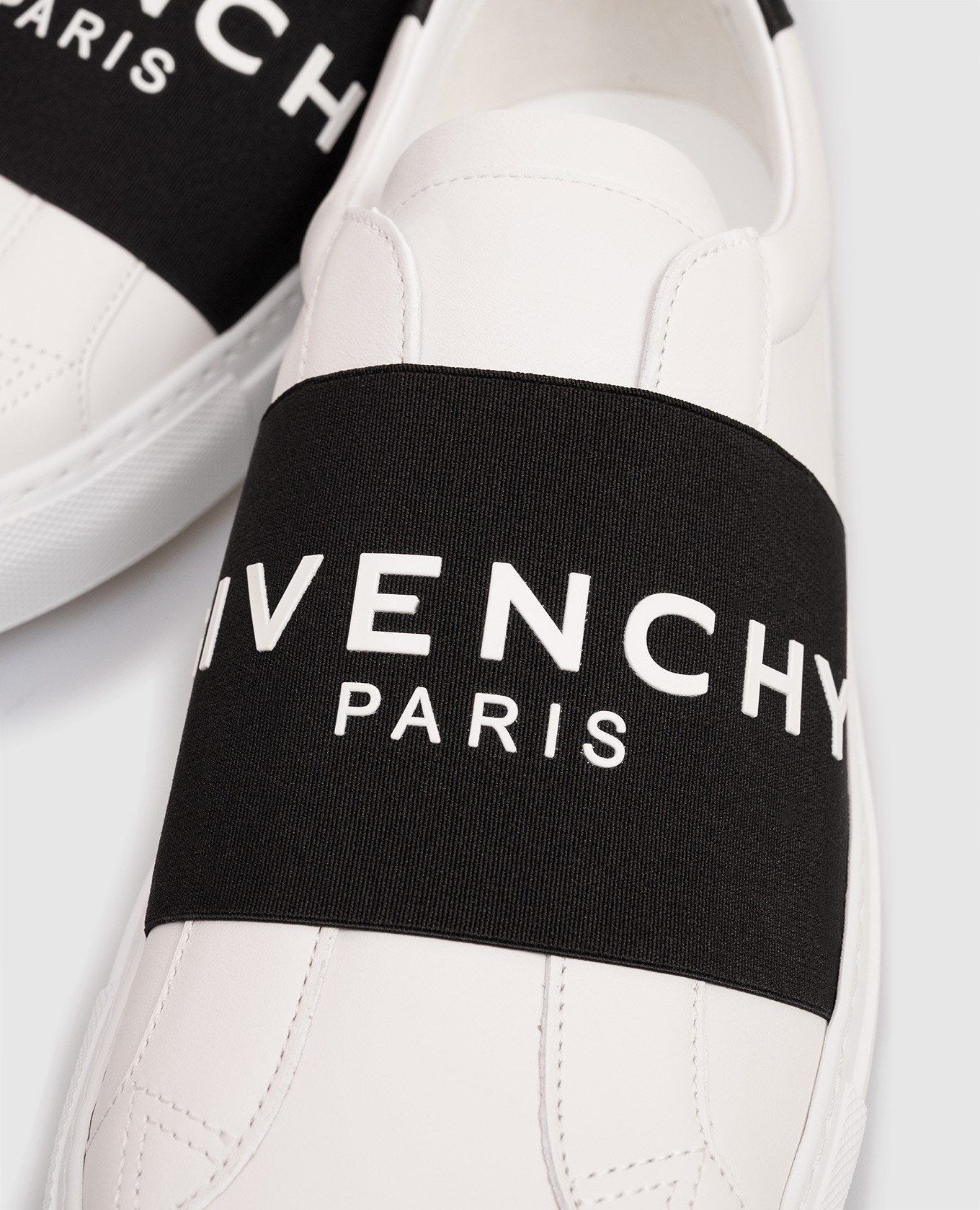 

White leather slip-ons with logo Givenchy