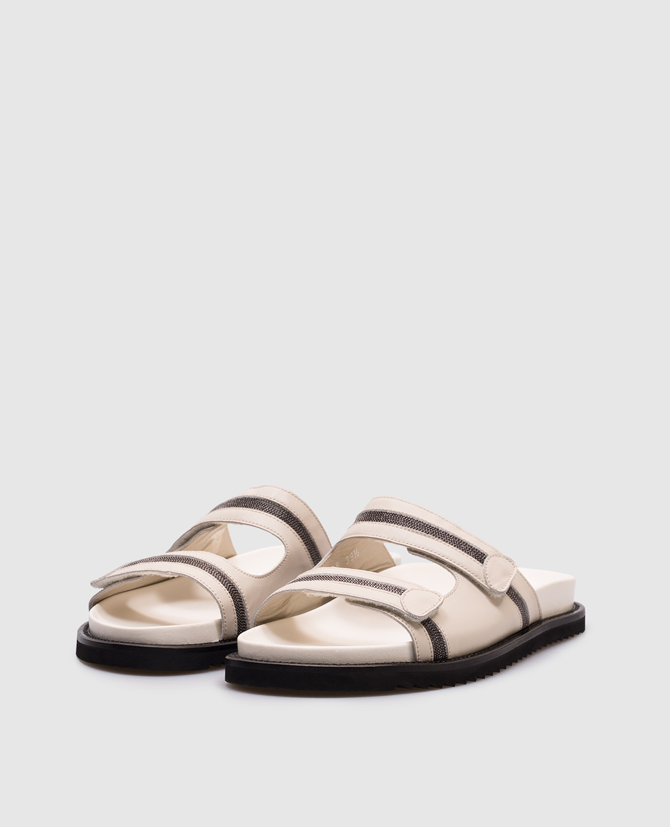

Beige leather flip-flops with a monil chain Doucal's