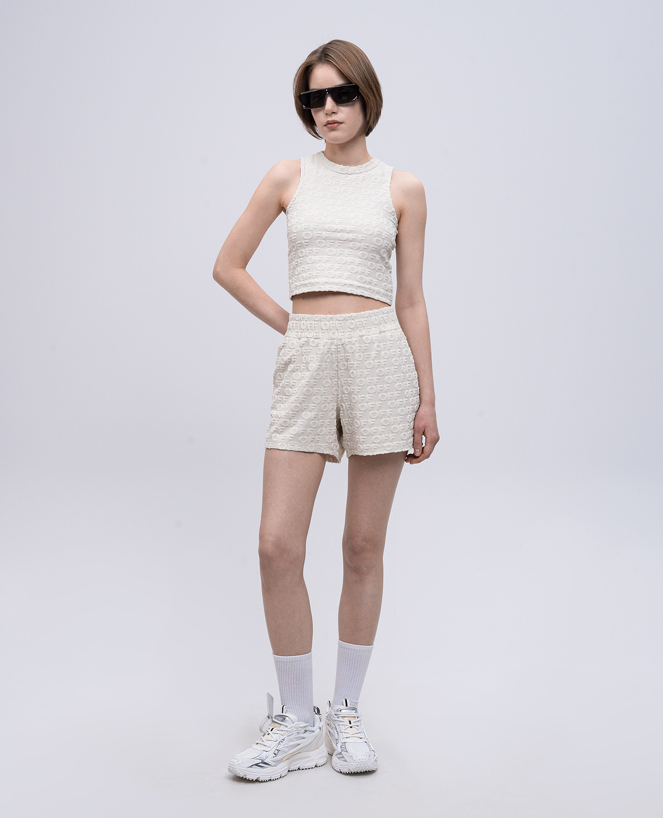 

Beige shorts with logo pattern Off-White