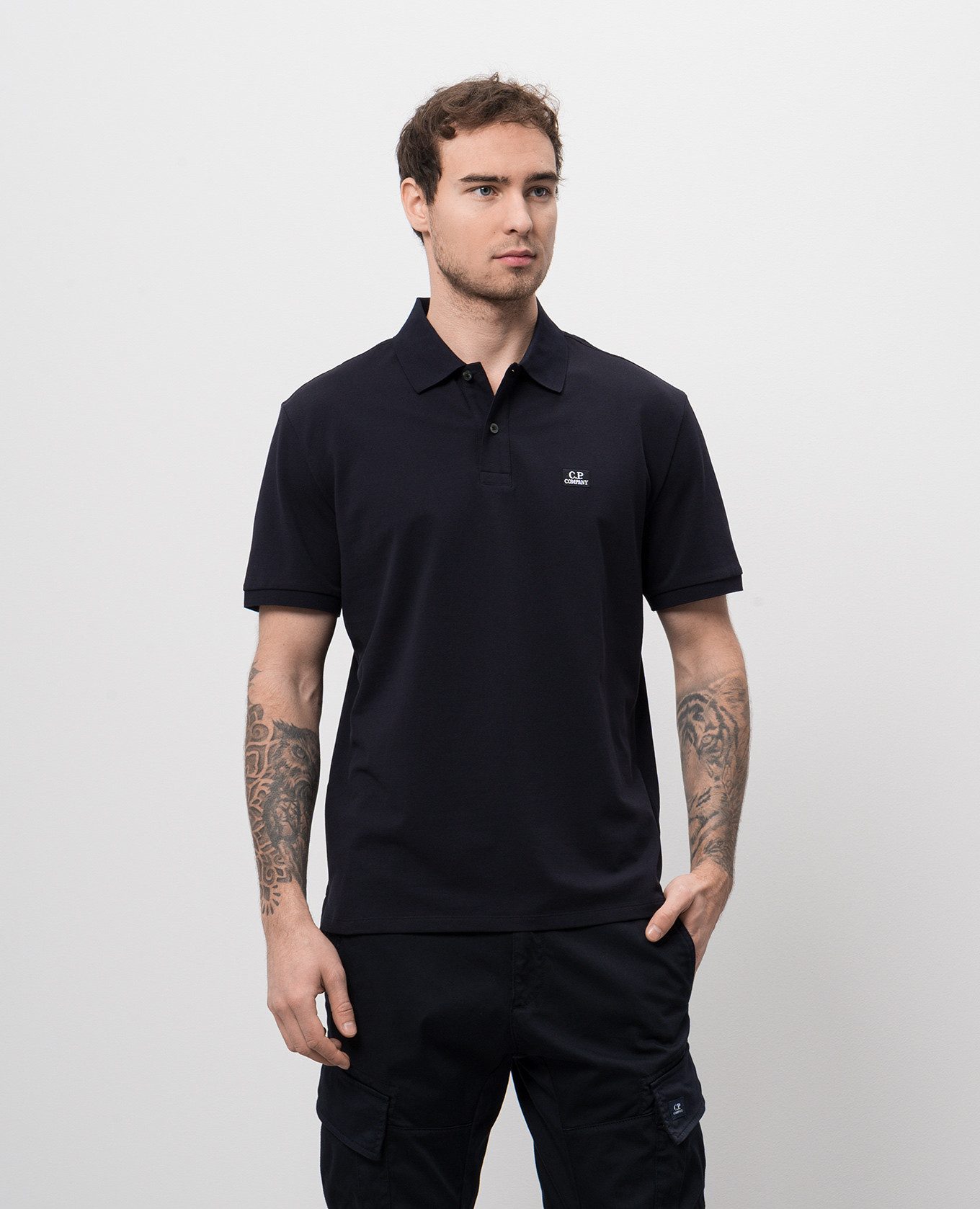 

Blue polo shirt with logo patch C.P. Company