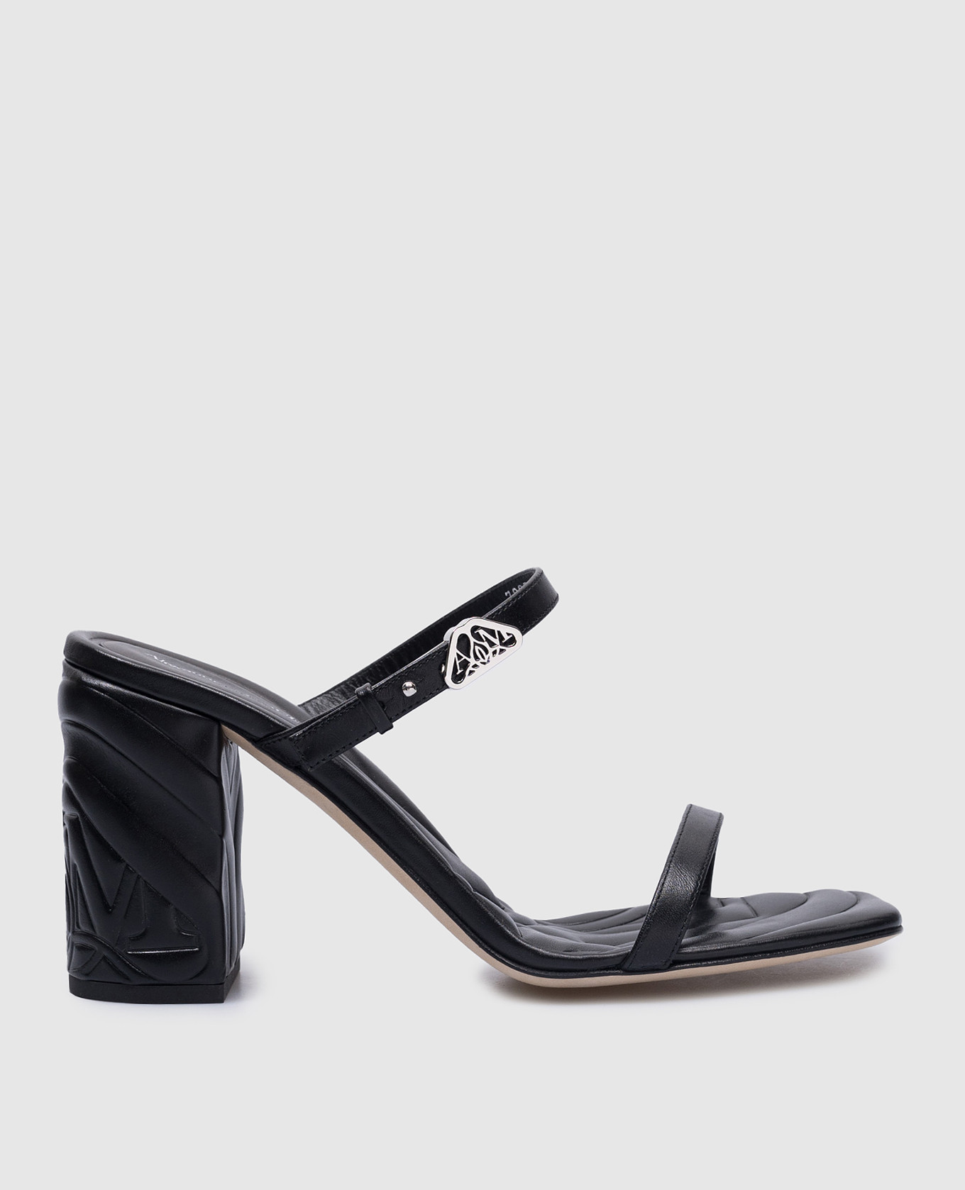 

Seal black leather mules with metal logo patch Alexander McQueen