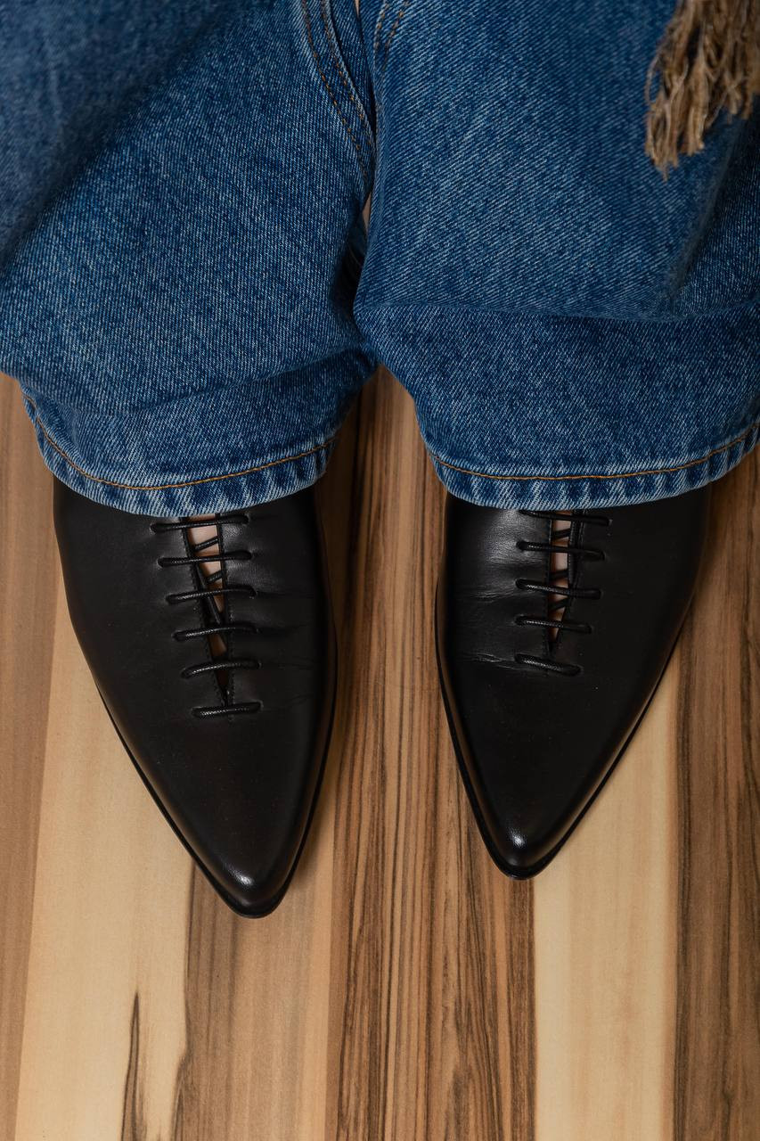 

River Lages black leather mules Ann Demeulemeester