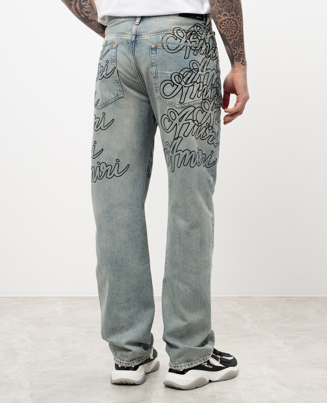 Blue jeans with logo print AMIRI 4