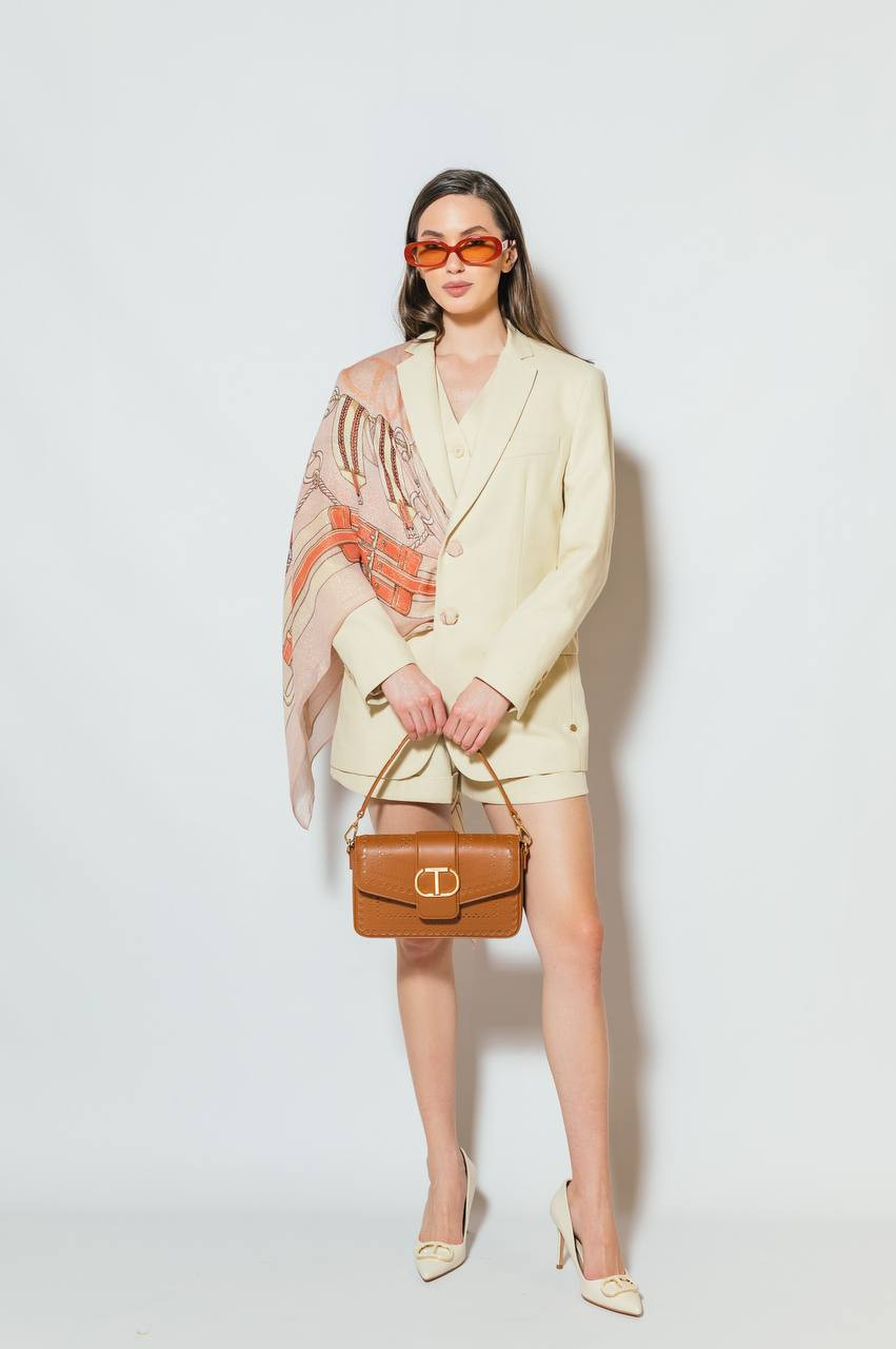 

Beige linen vest with logo emblem Twinset