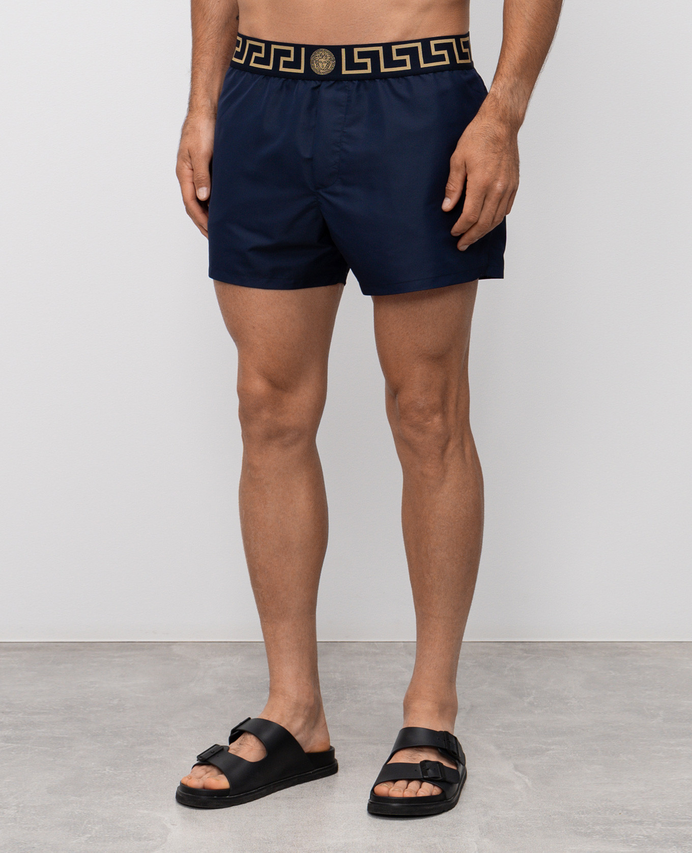 

Blue swim shorts with logo Versace