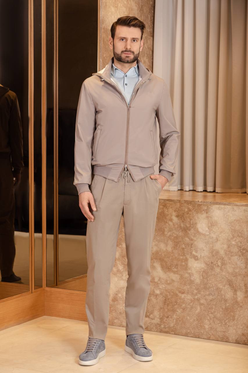 

Beige pants with logo Enrico Mandelli