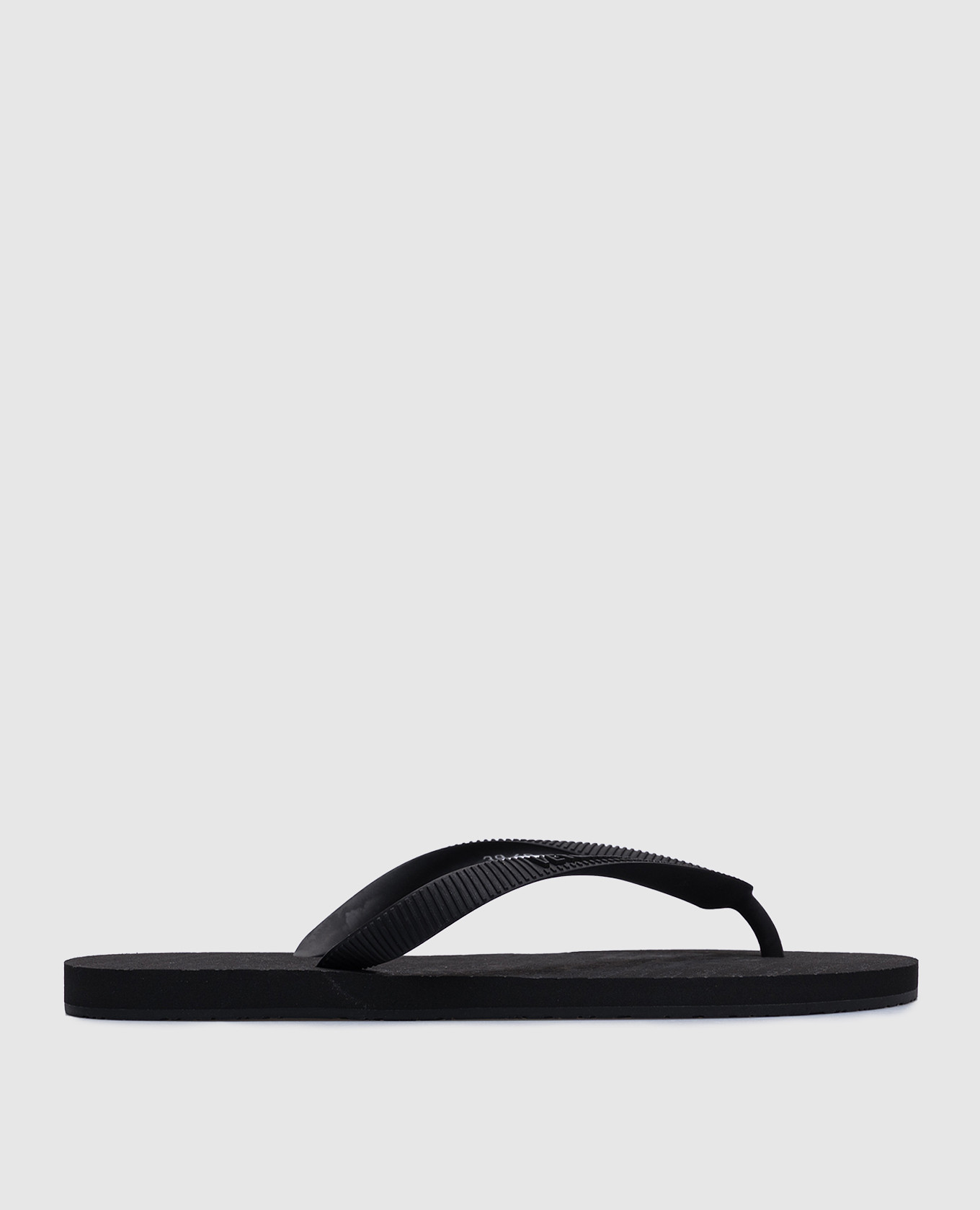 Black flip-flops with embossed logo Vetements