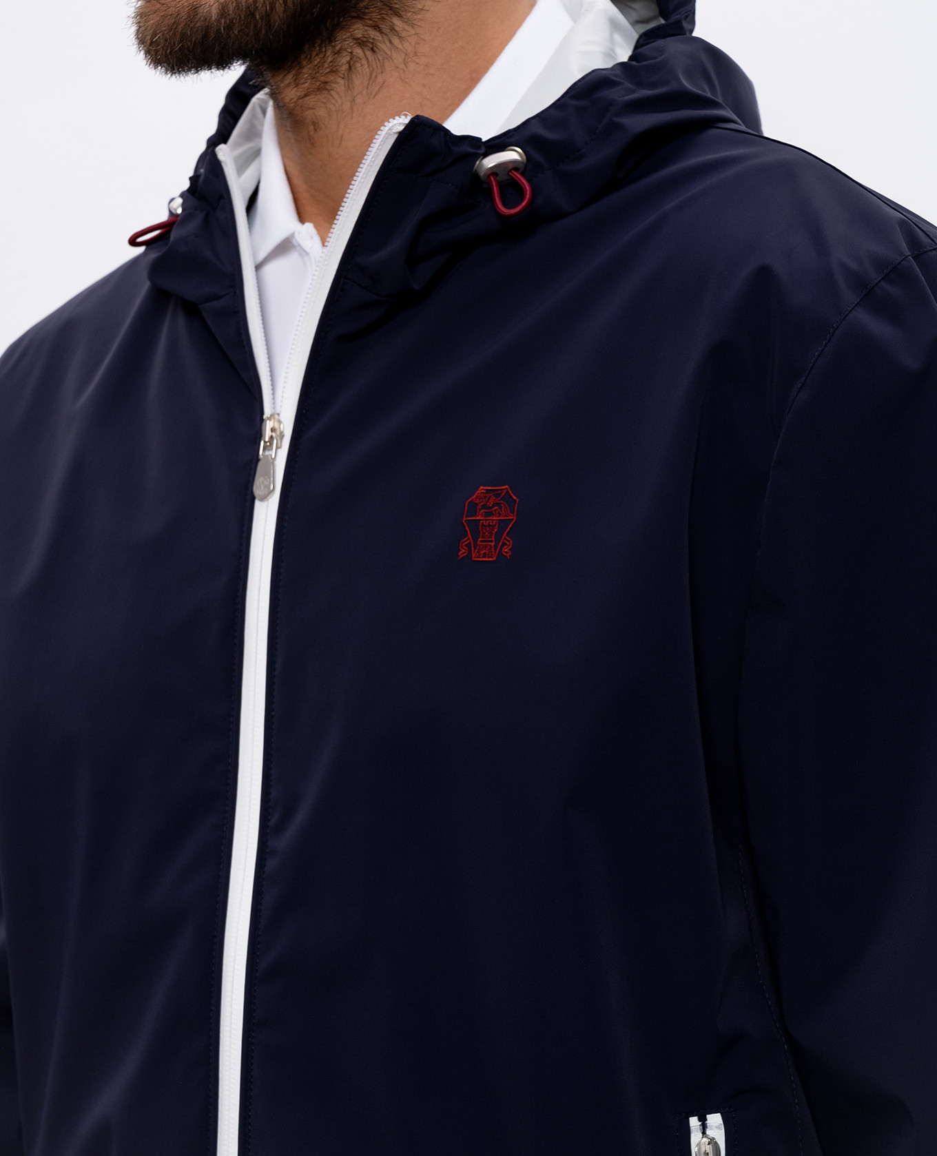 

Blue sports jacket with embroidered emblem Brunello Cucinelli