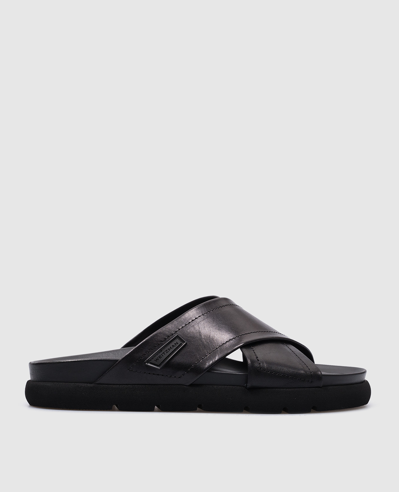 

FLX CRSCRS logo flip flops in black leather Stuart Weitzman