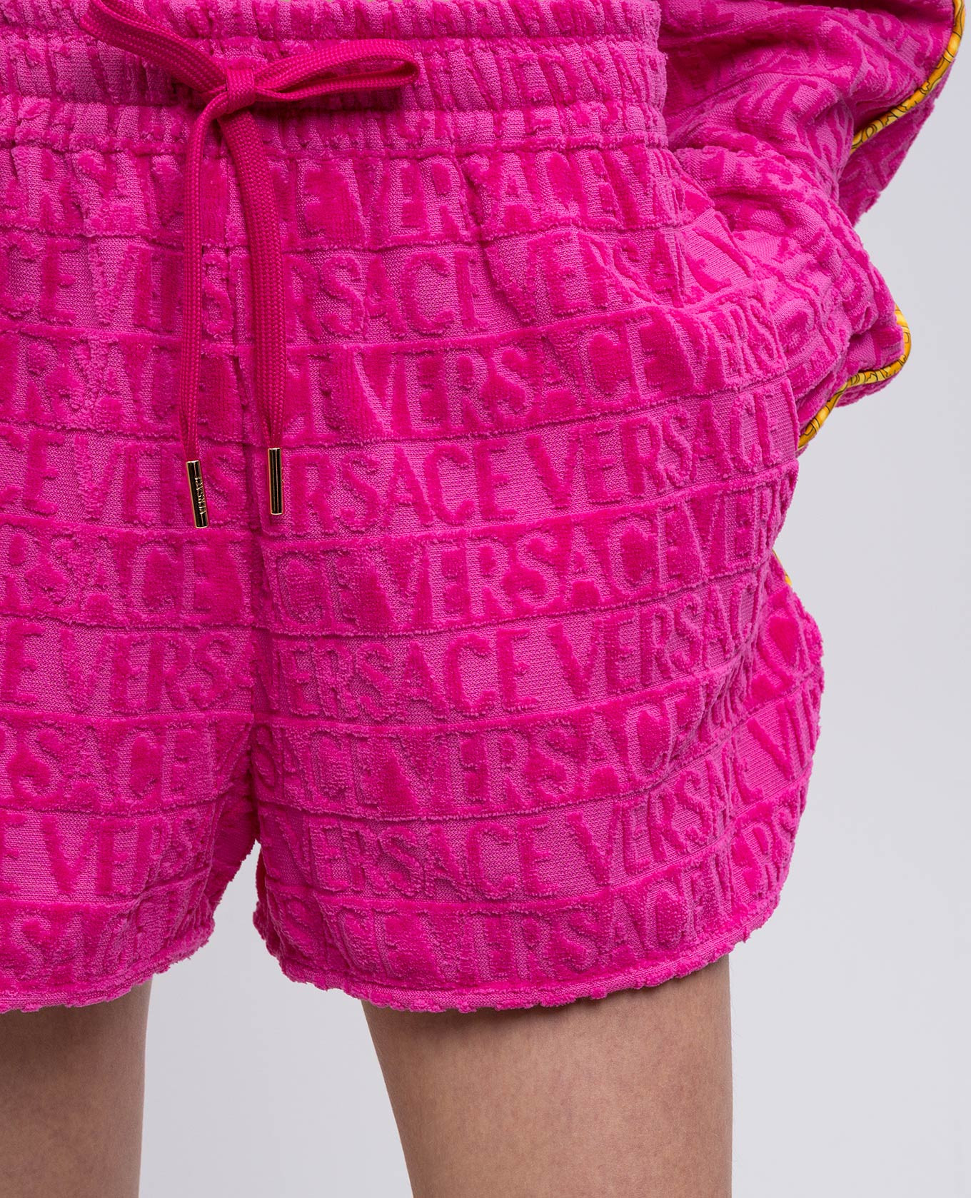 

Pink terry shorts with logo Versace