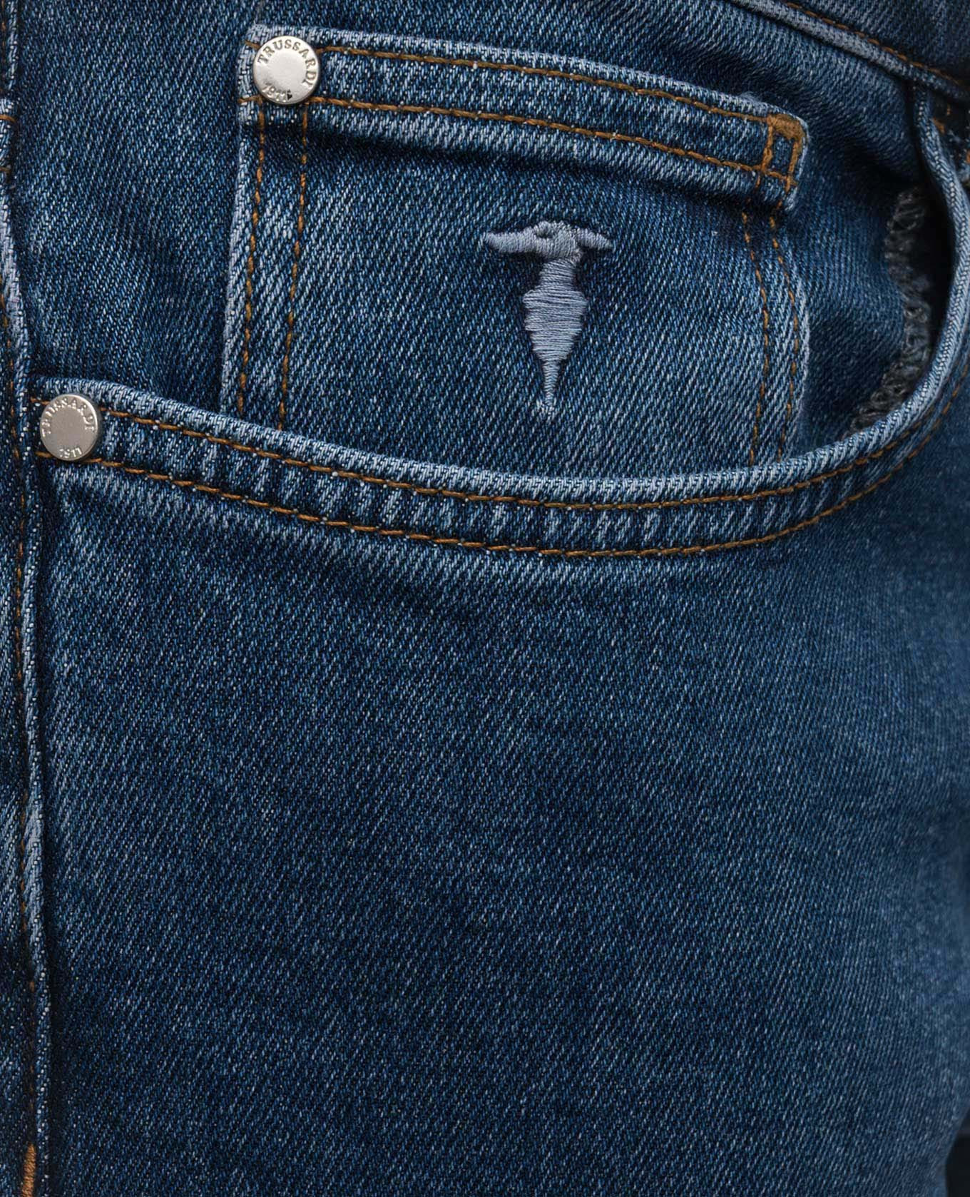 

Blue jeans with embroidered emblem Trussardi