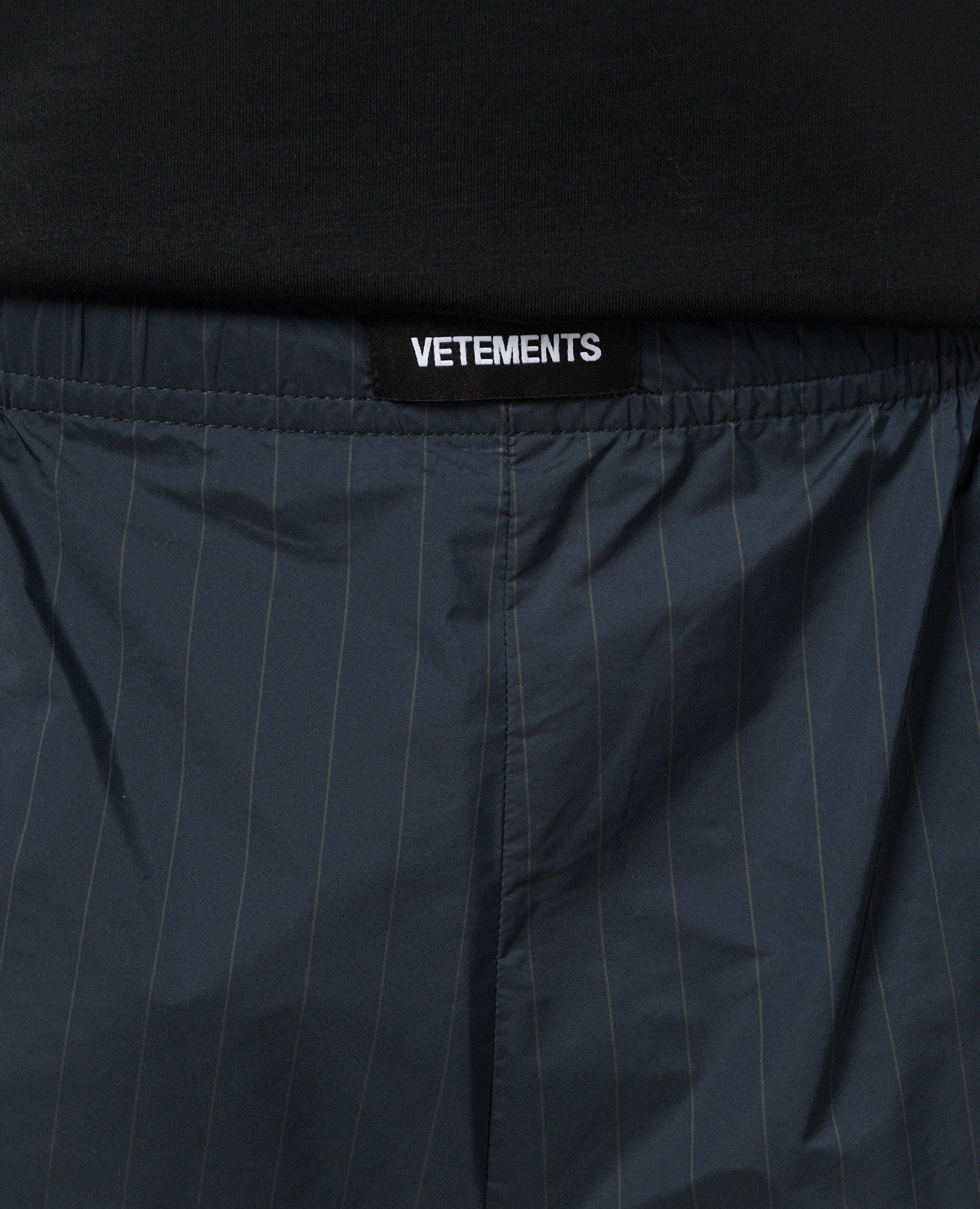 

Blue shorts in a stripe with a logo Vetements