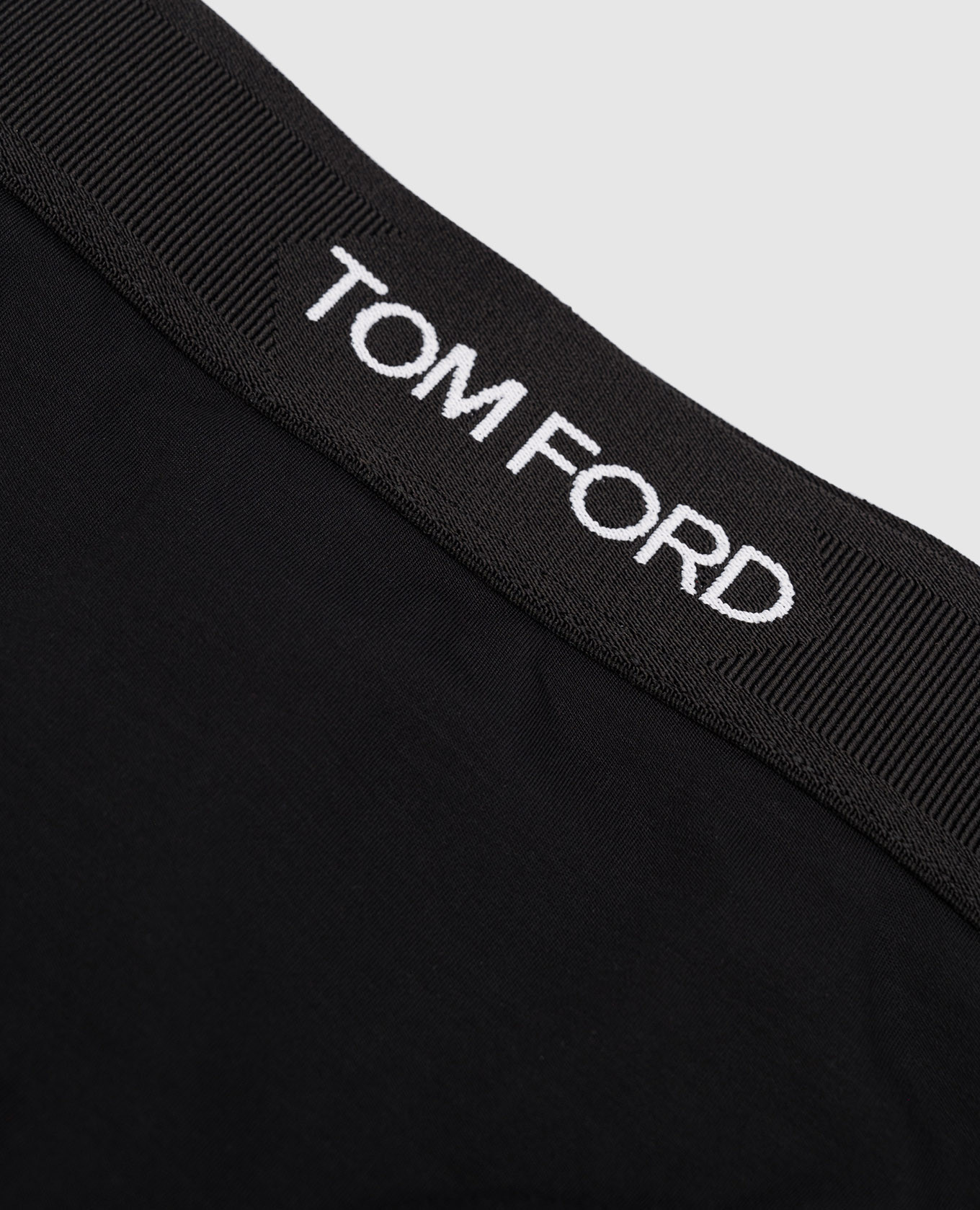 

Black briefs with a logo pattern Tom Ford