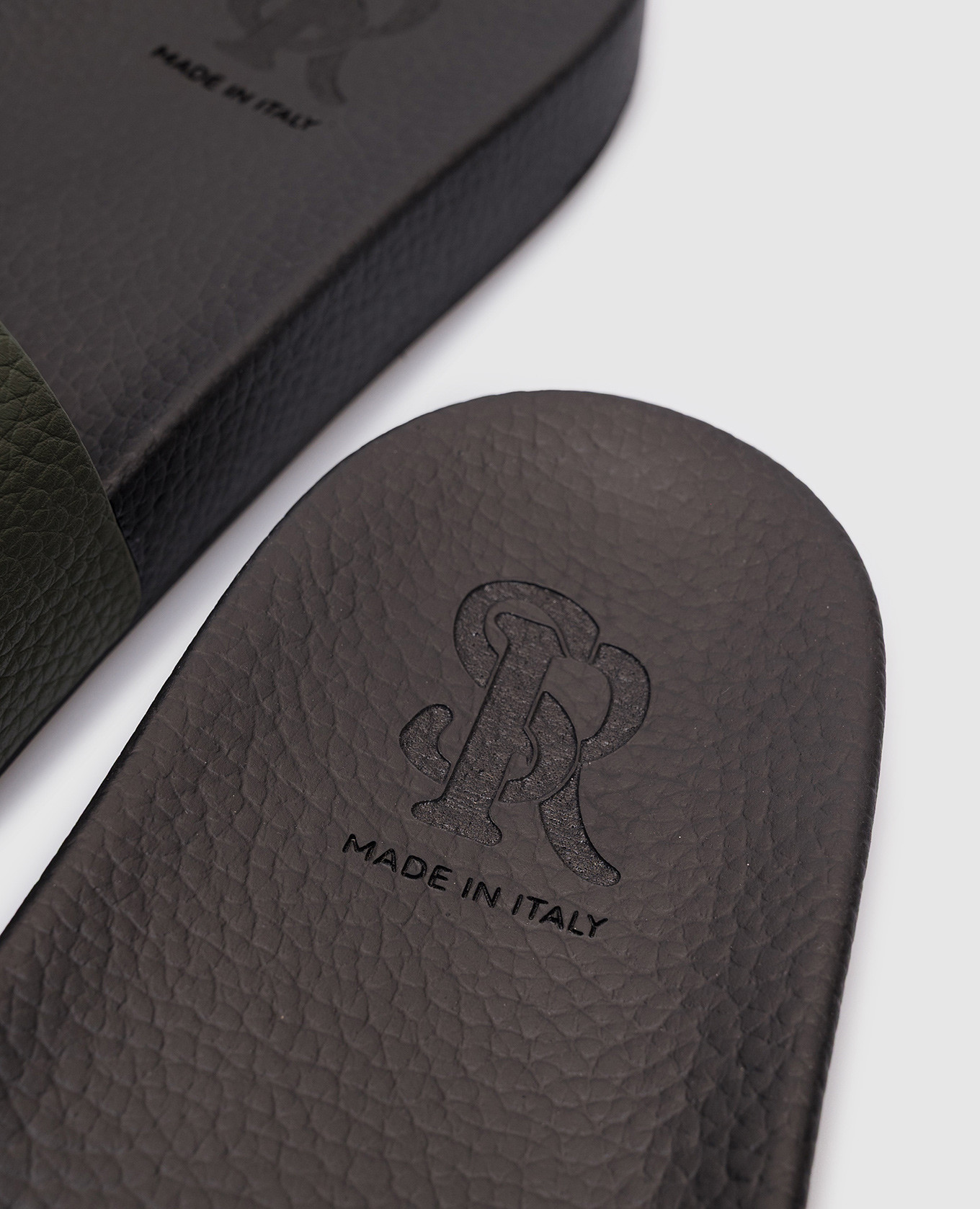 

Green leather sliders with logo Stefano Ricci