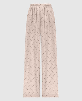 Balenciaga Beige pants with logo print 814016TRLB1