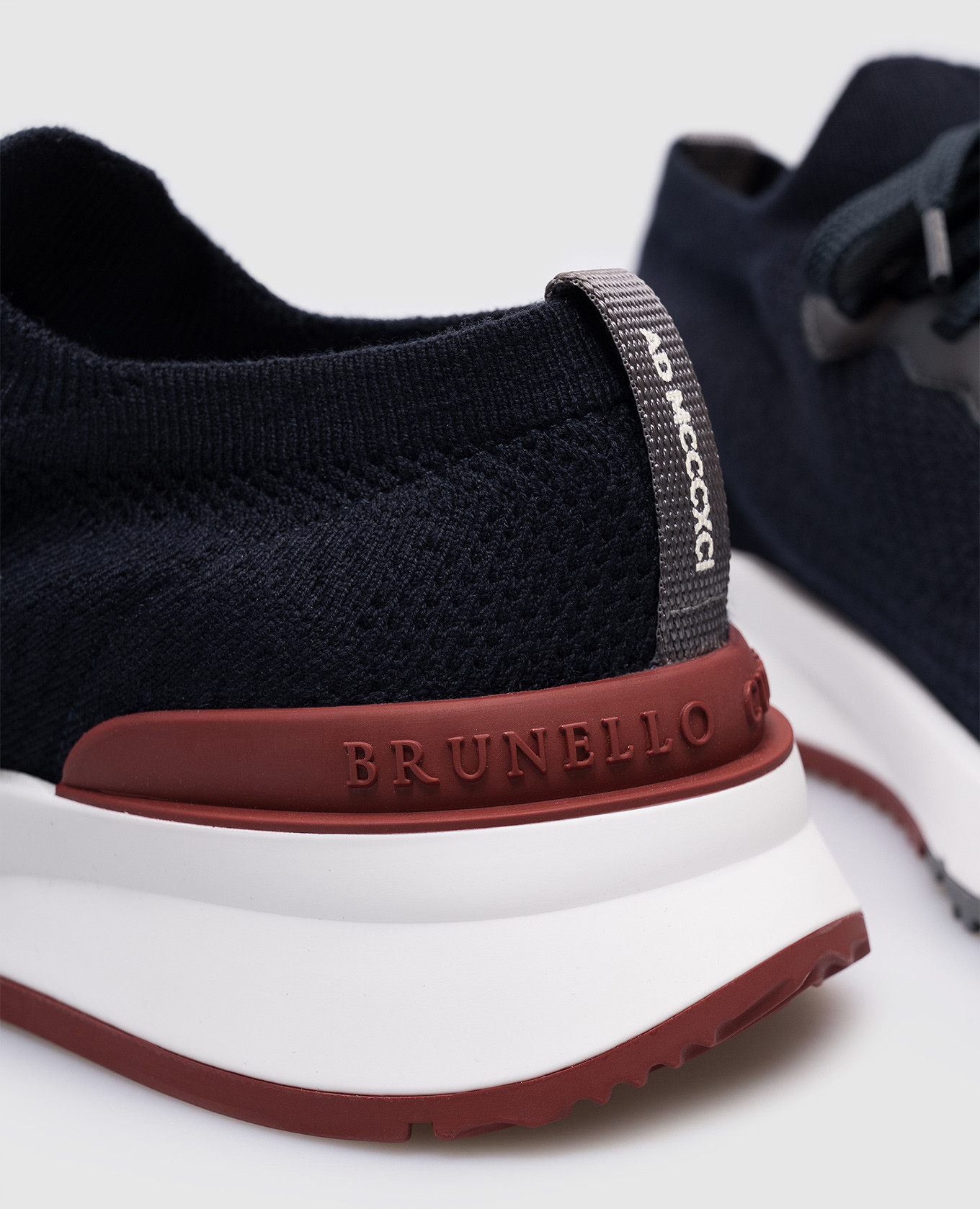 

Blue sneakers with textured logo Brunello Cucinelli