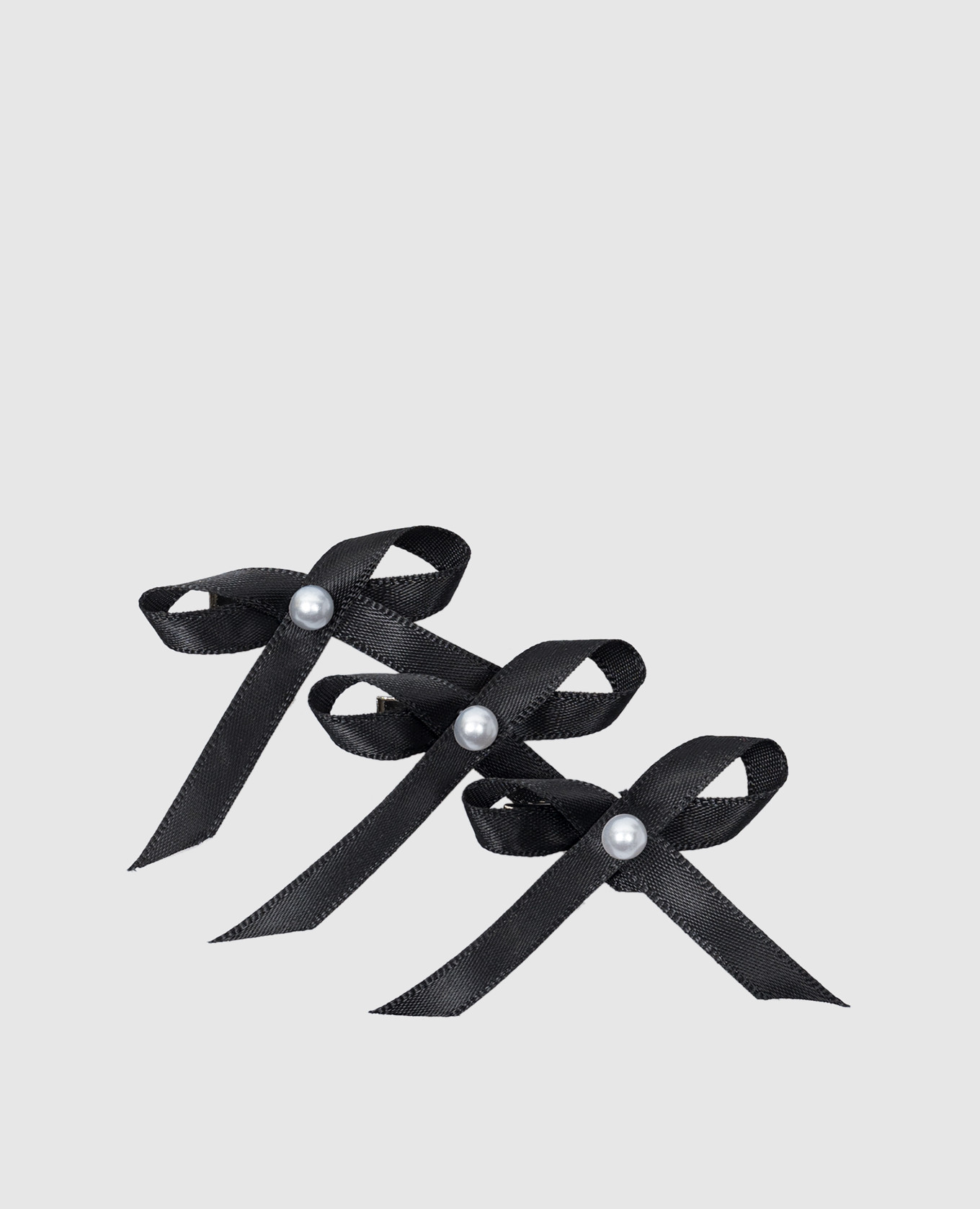 

Set of black ASHLEY MINI BOW studs LELET NY