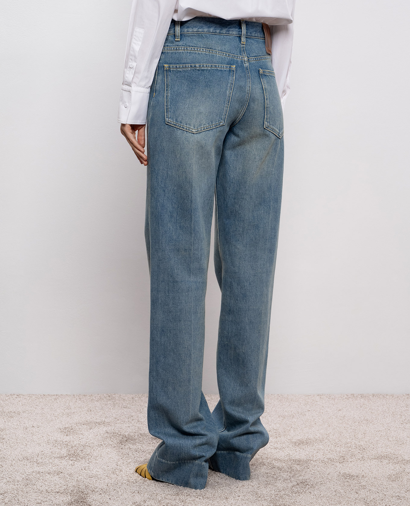 Blue jeans with a worn effect Valentino 4
