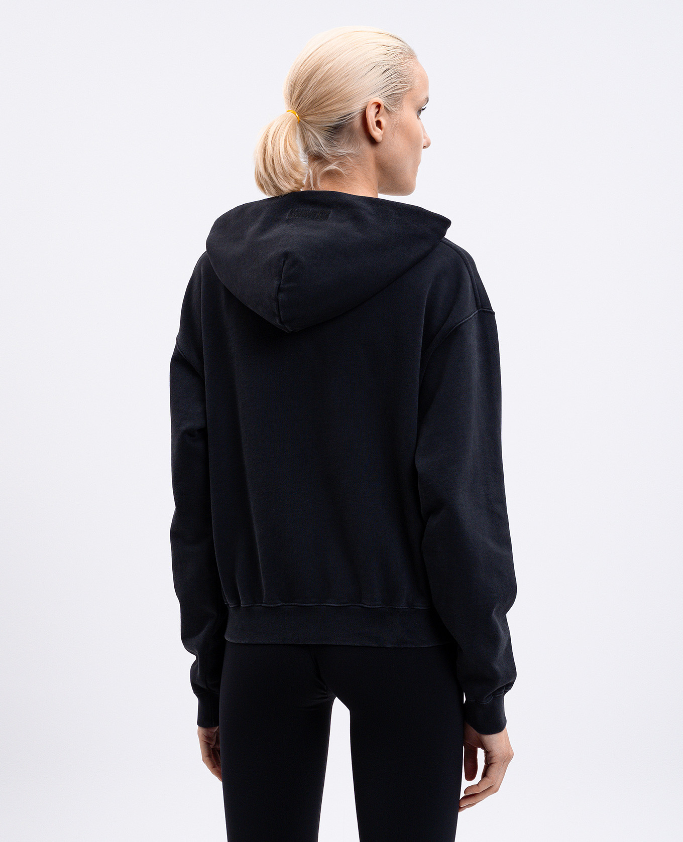 

Black sports jacket with a print of the inscription Vetements