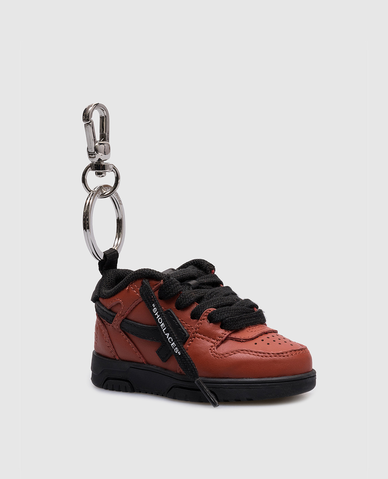 

Red keychain-pendant in the form of a brand sneaker Out of office Off-White