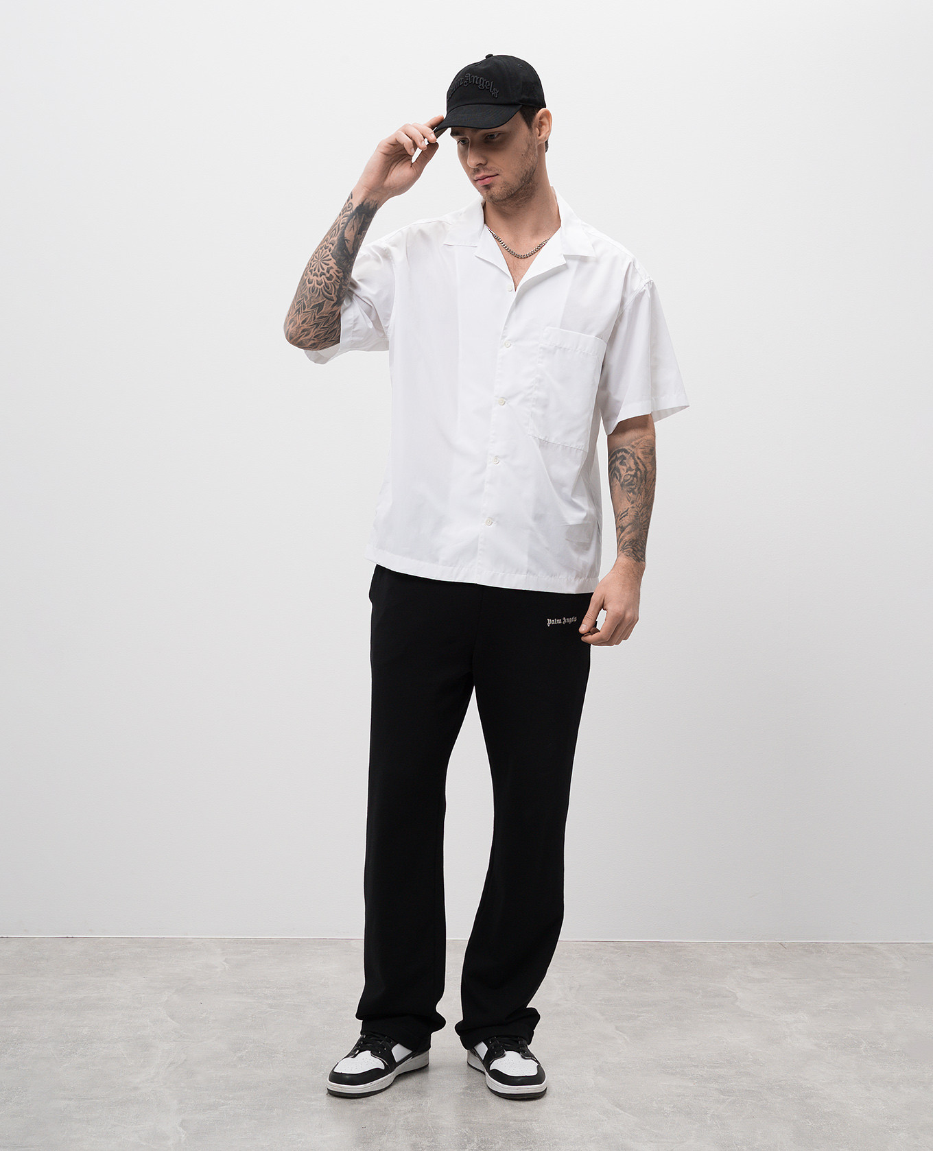 

White shirt with contrasting logo print Palm Angels